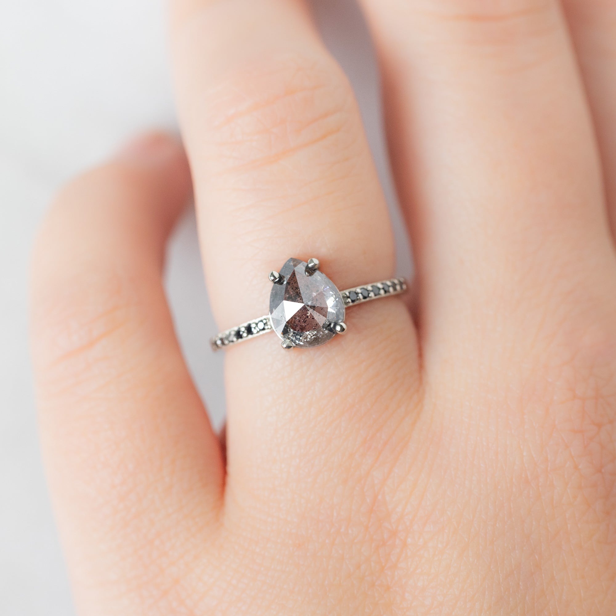 The Willow Ring with a 1.56ct Pear Salt and Pepper Diamond in 14K White Gold  on Model