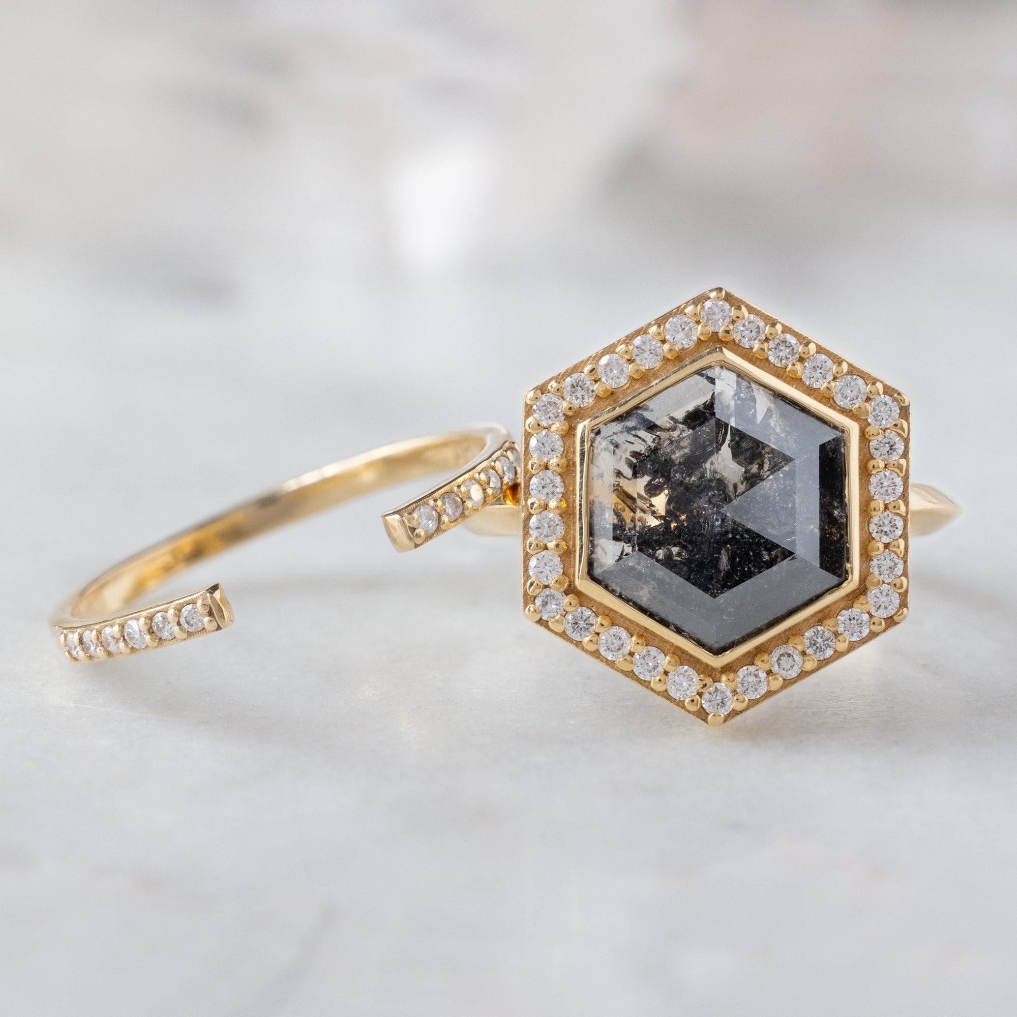 The Dahlia Luxe with a 2.68ct Salt and Pepper Hexagon Diamond in 18K Yellow Gold with the Open Cuff White Pavé Diamond Stacking Band