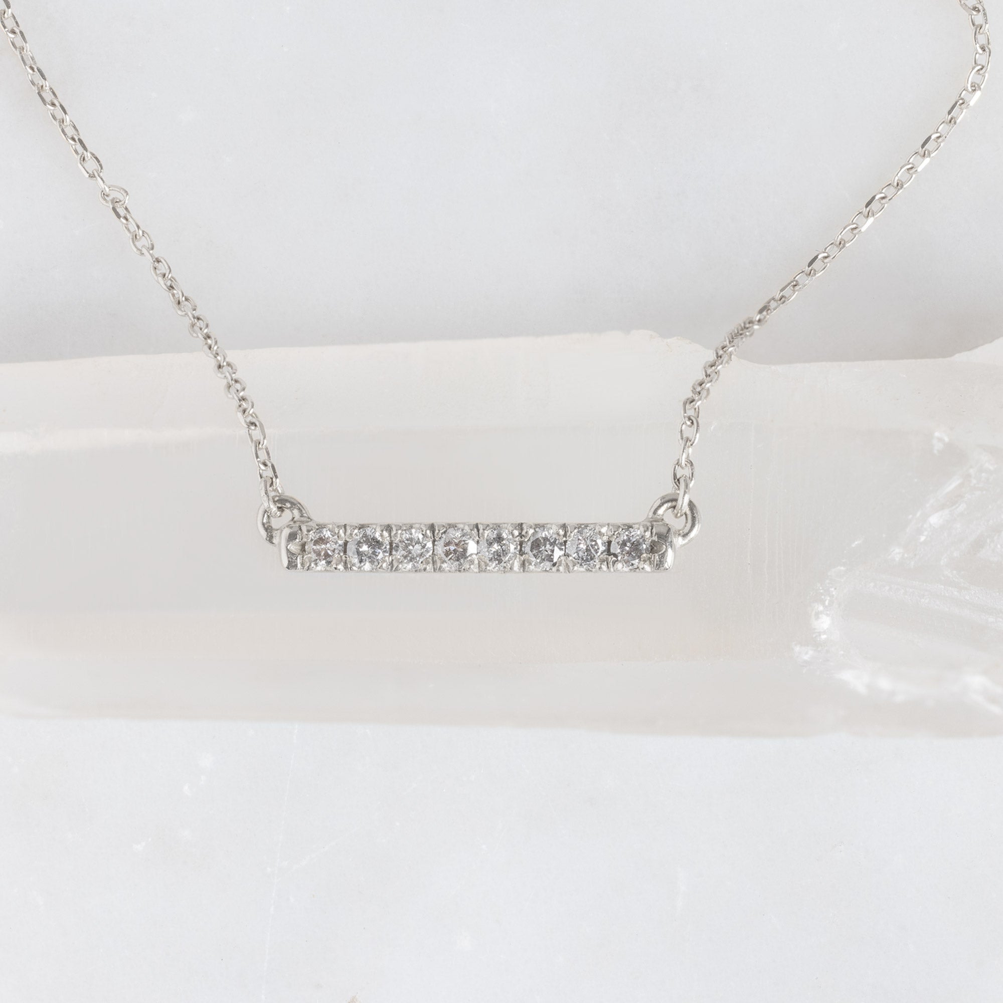 The Salt and Pepper Diamond Bar Necklace in White Gold on White Marble