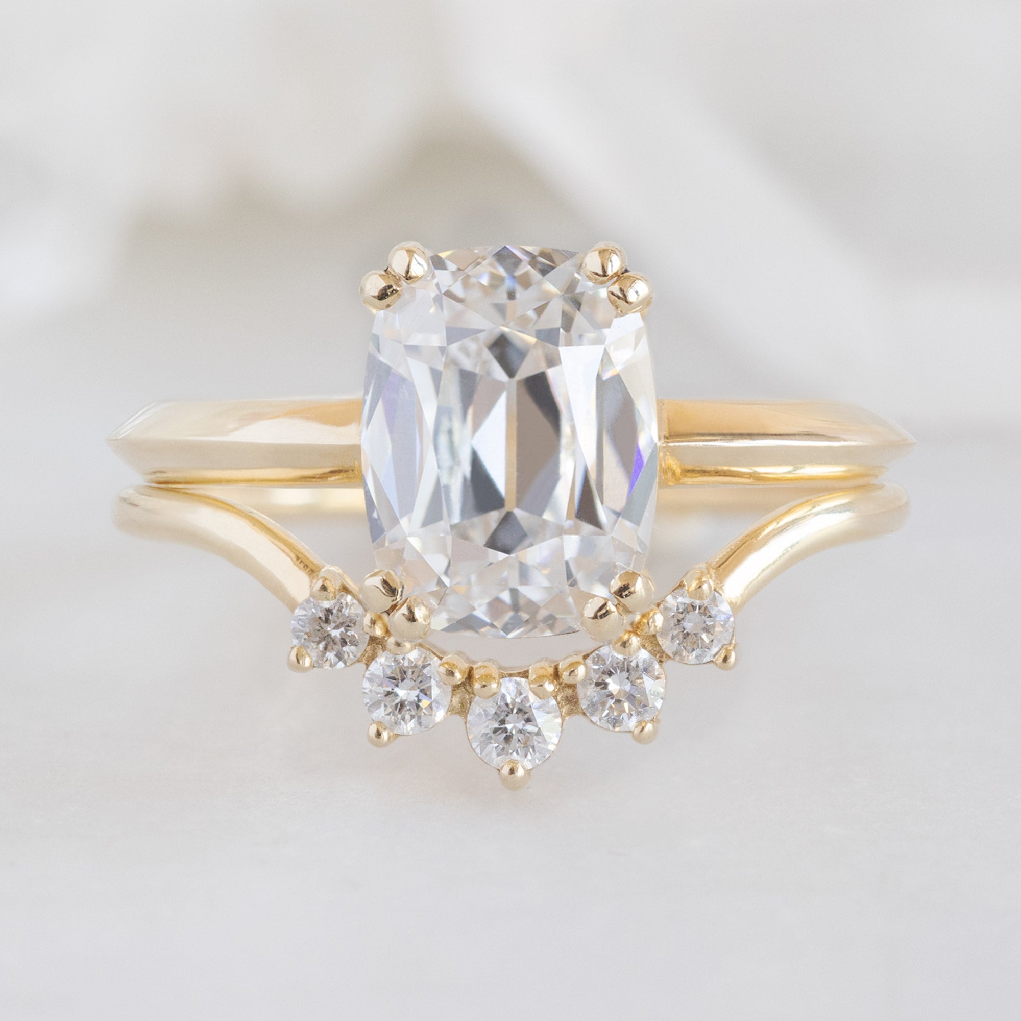 One of a Kind Round White Diamond Sunburst Stacking Band in Yellow Gold stacked with Old Mine Cut White Diamond Engagement Ring