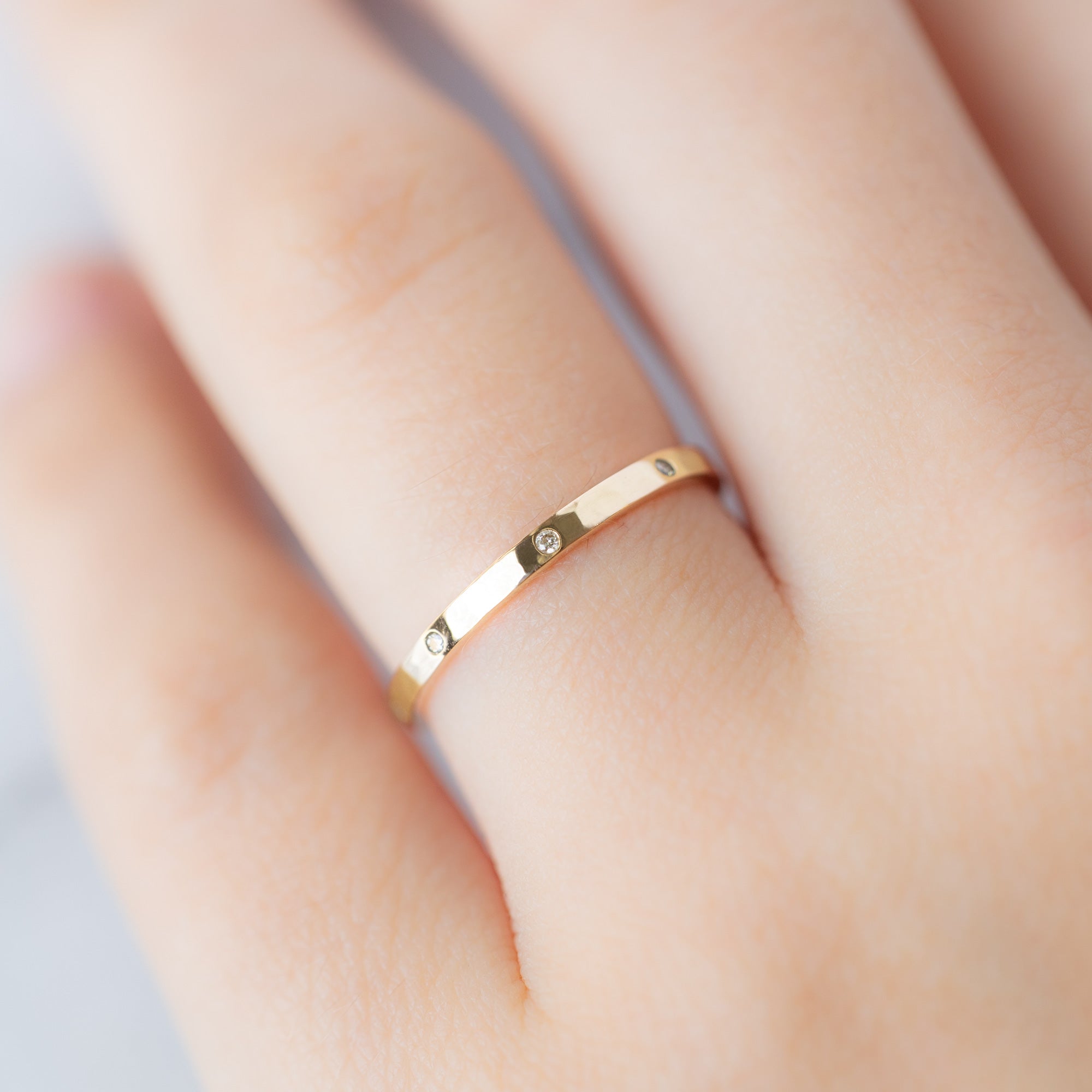Salt and Pepper Diamond Eternity Band in 14K Yellow Gold on Model