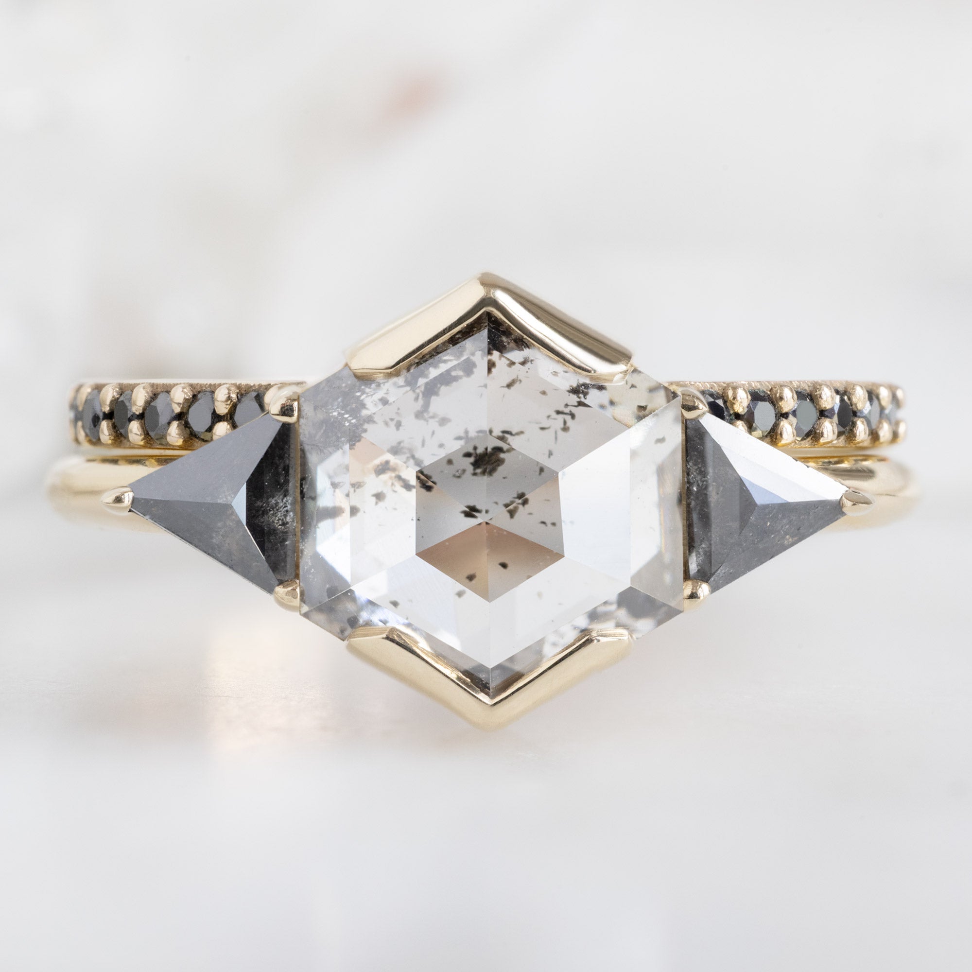 Open Cuff Black Diamond Pavé Stacking Band in 14K Yellow Gold Stacked with Three Stone Diamond Engagement Ring