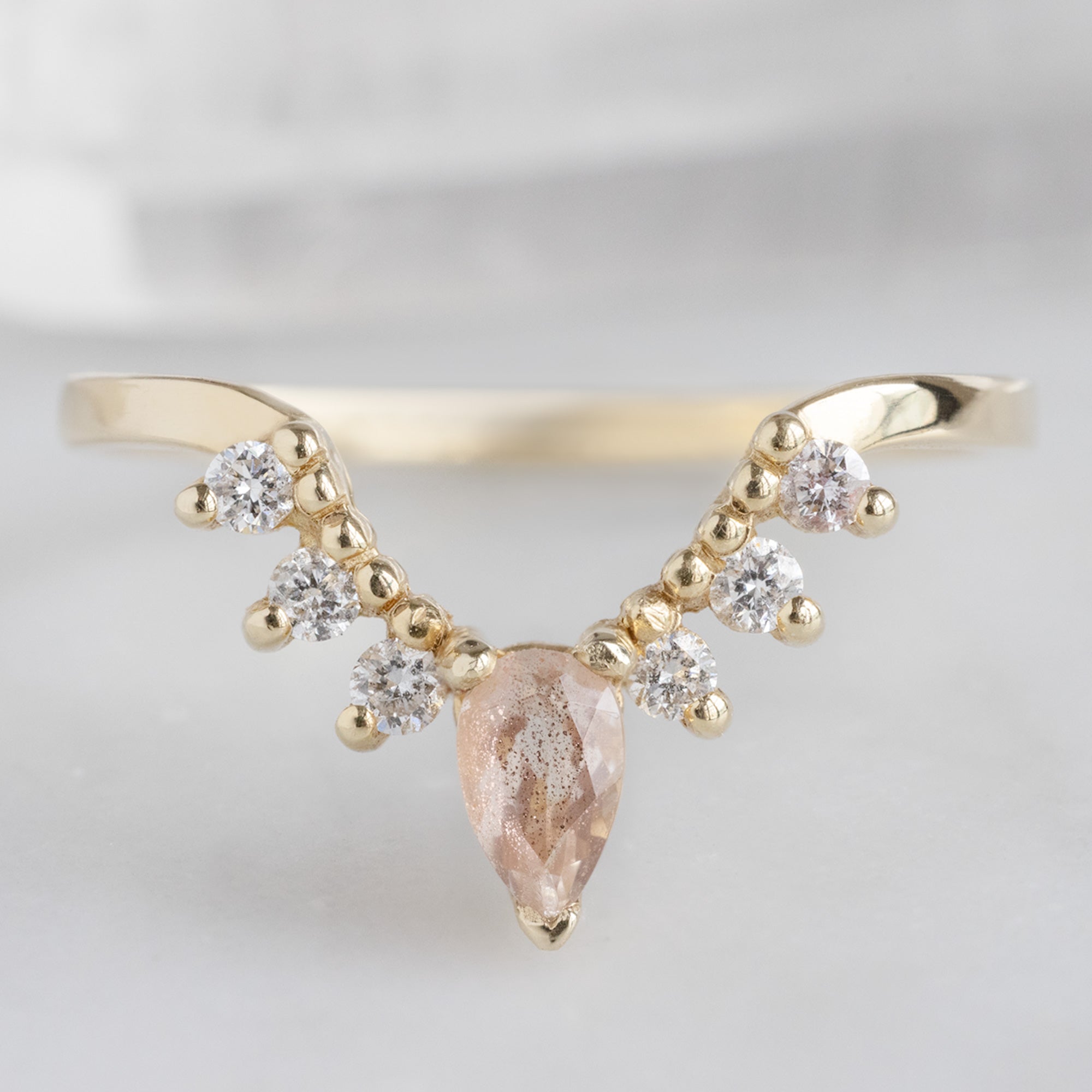 One of a Kind Sunstone and White Diamond Sunburst Stacking Band in 14K Yellow Gold on White Marble