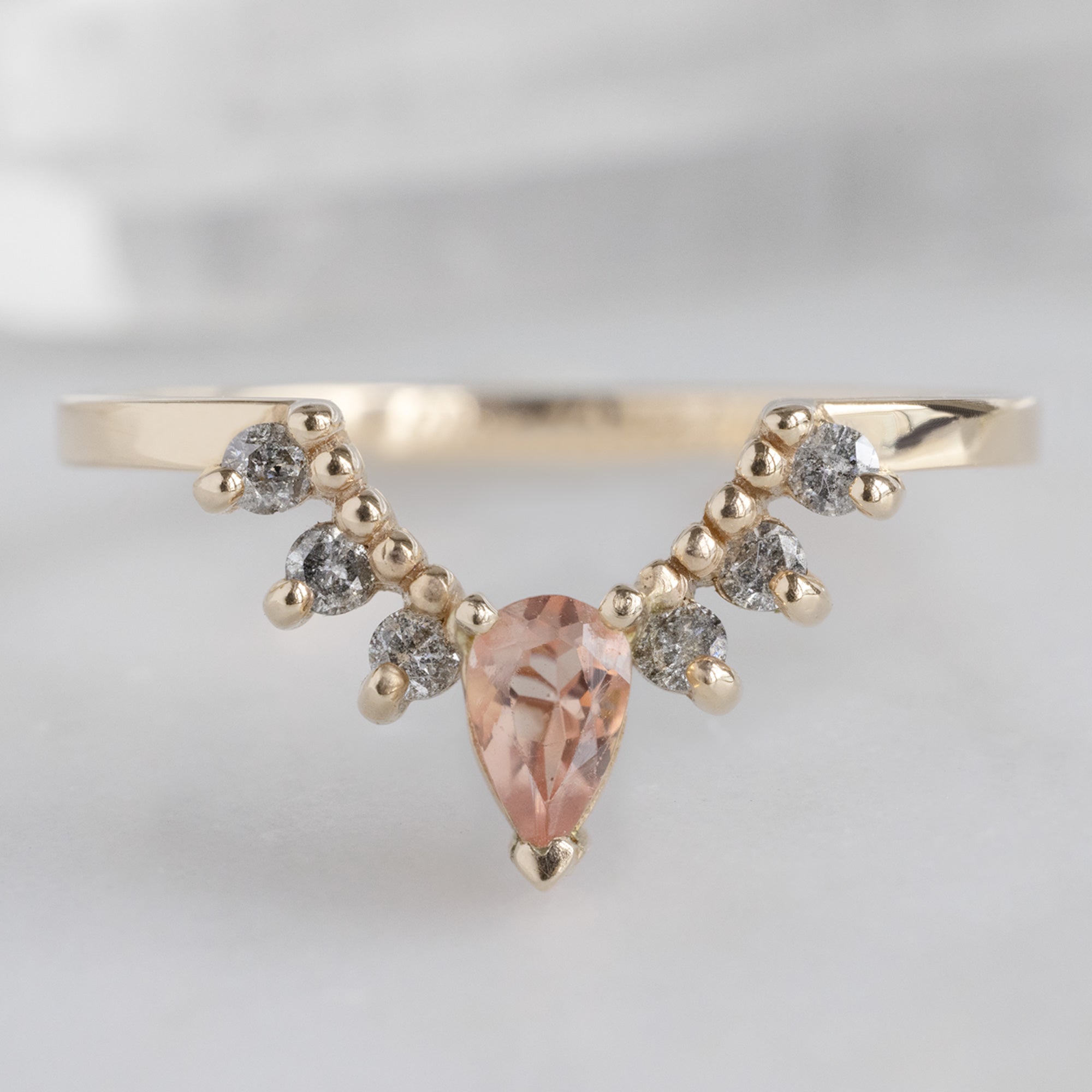 One of a Kind Sunstone and Salt and Pepper Diamond Sunburst Stacking Band in 14K Yellow Gold on White Marble