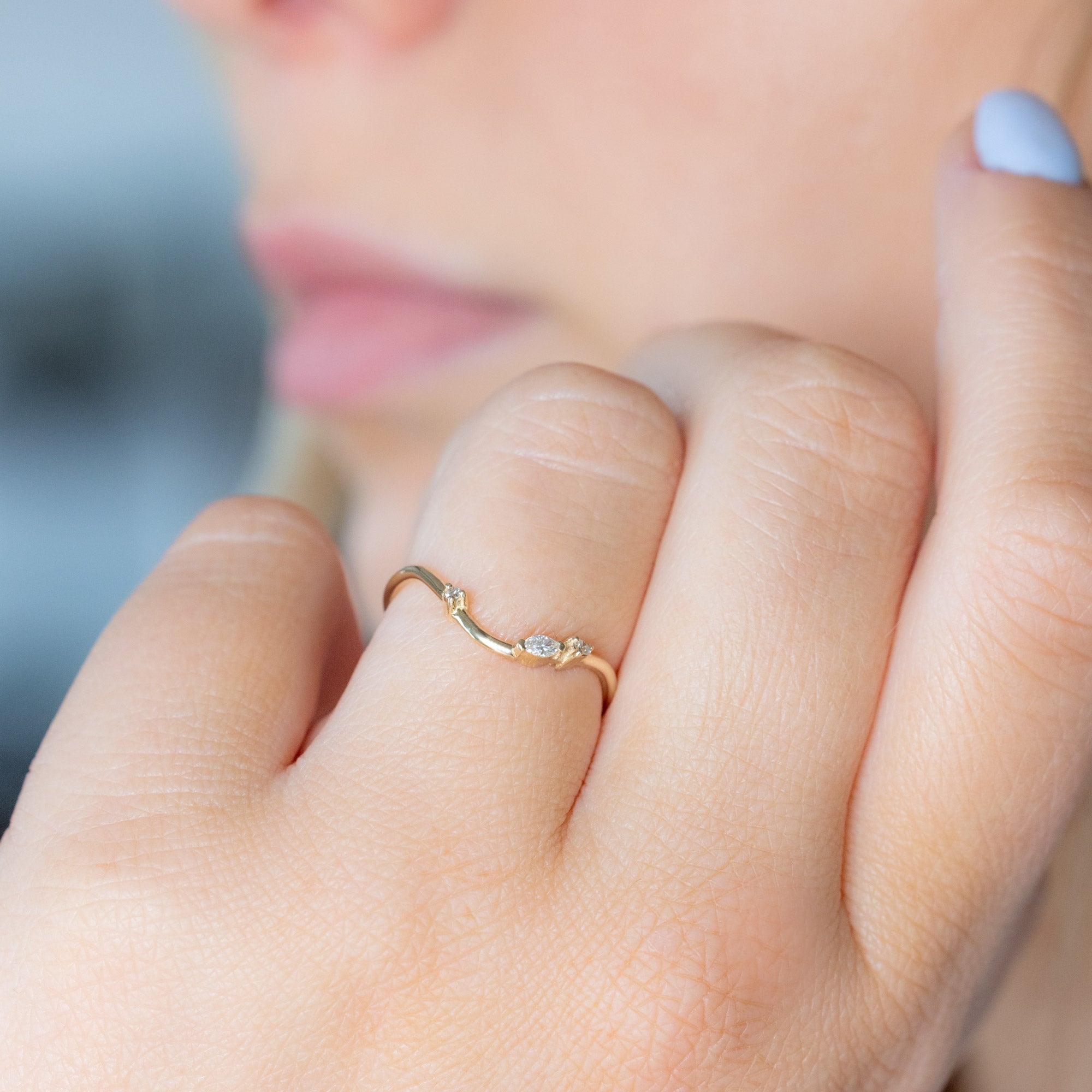 Asymmetrical Marquise Diamond Arc Stacking Band in 14K Yellow Gold worn solo on model