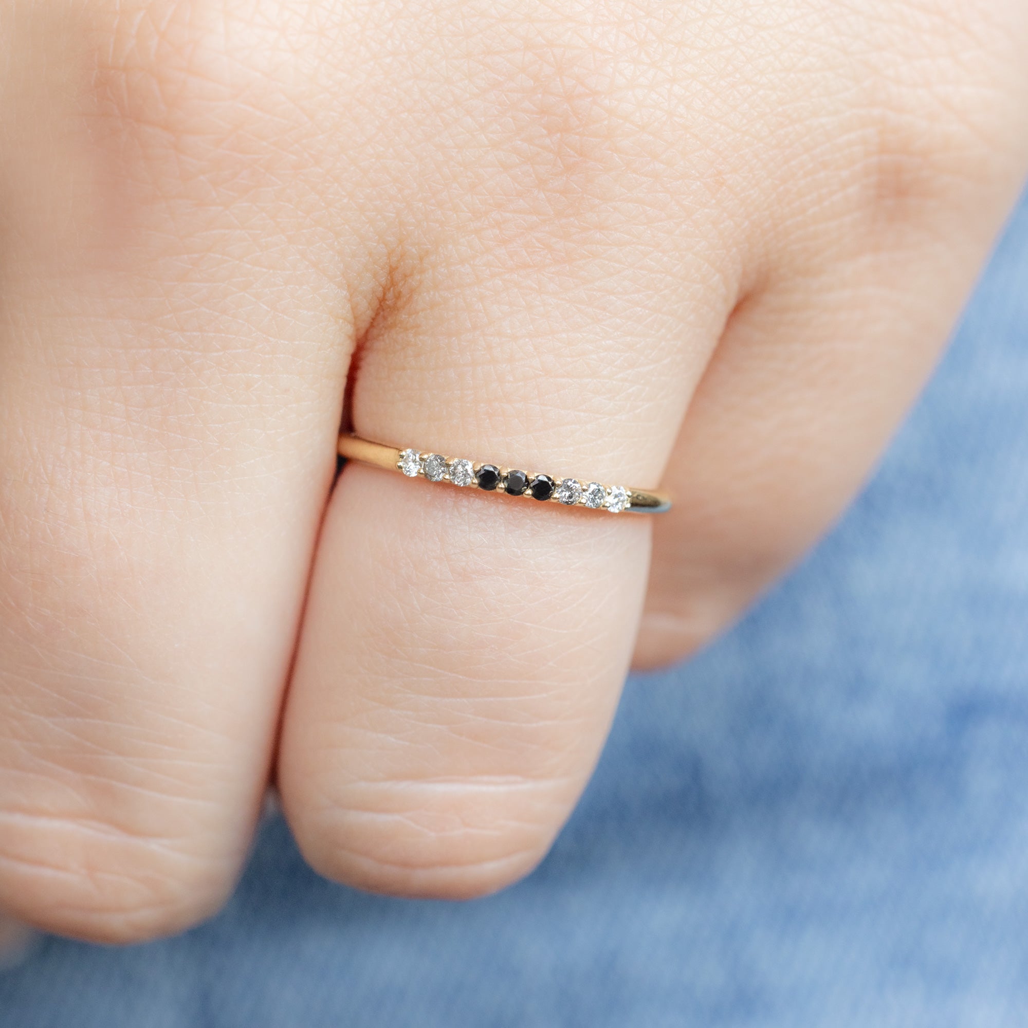 The Luxe Ombré Diamond Pavé Wedding Band in 14K Yellow Gold on Model with hand in pocket