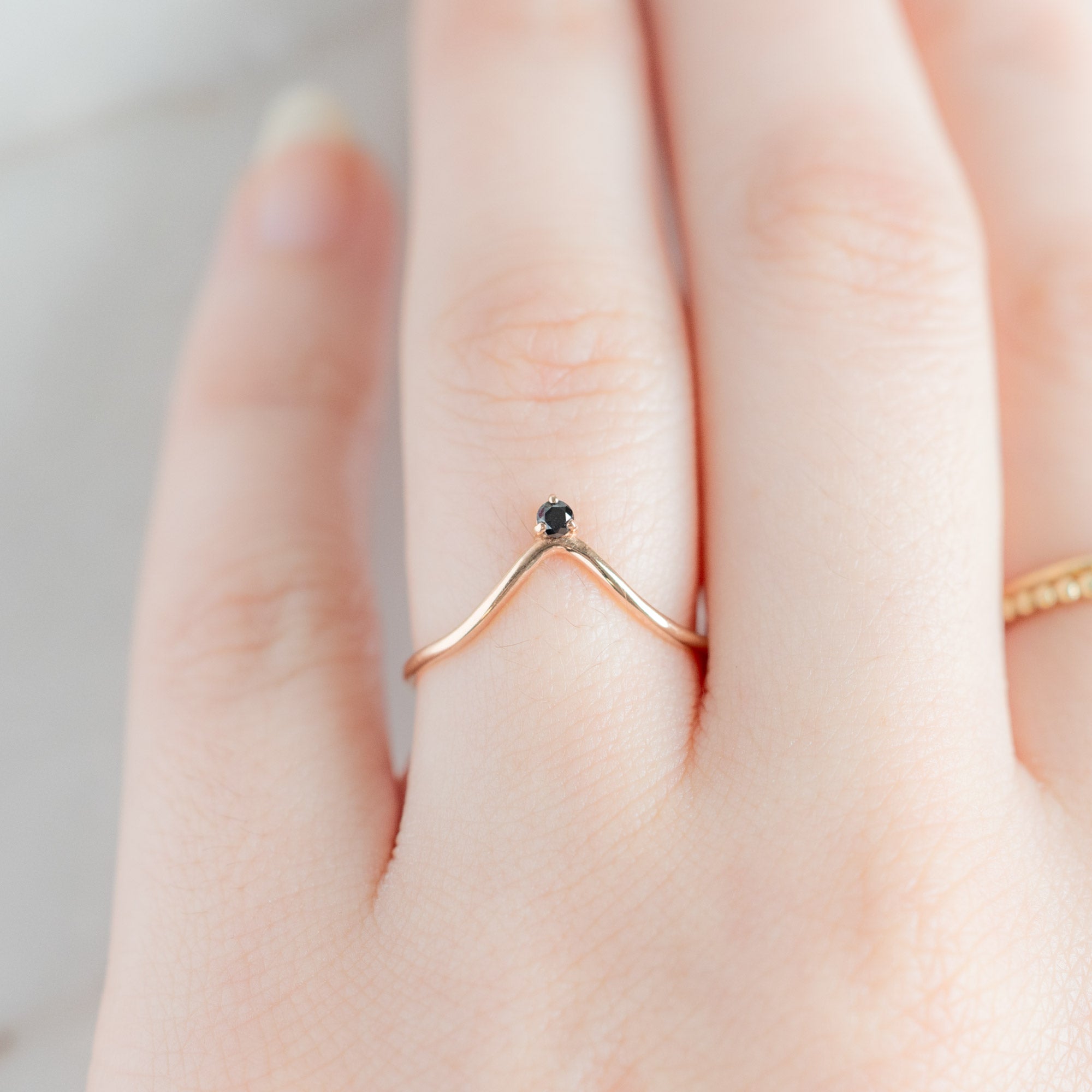 Black Diamond Crown Stacking Band in 14K Rose Gold on Model
