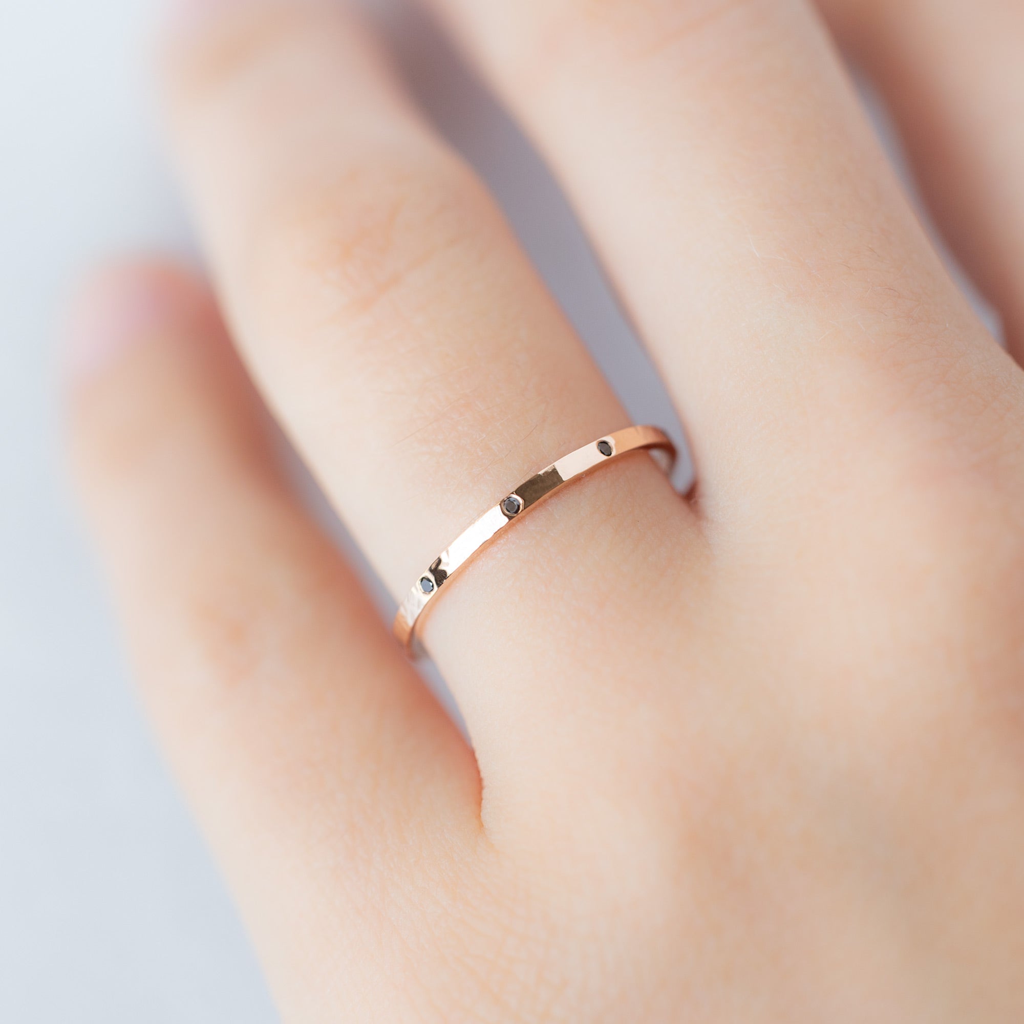 Black Diamond Eternity Band in 14K Rose Gold on Model