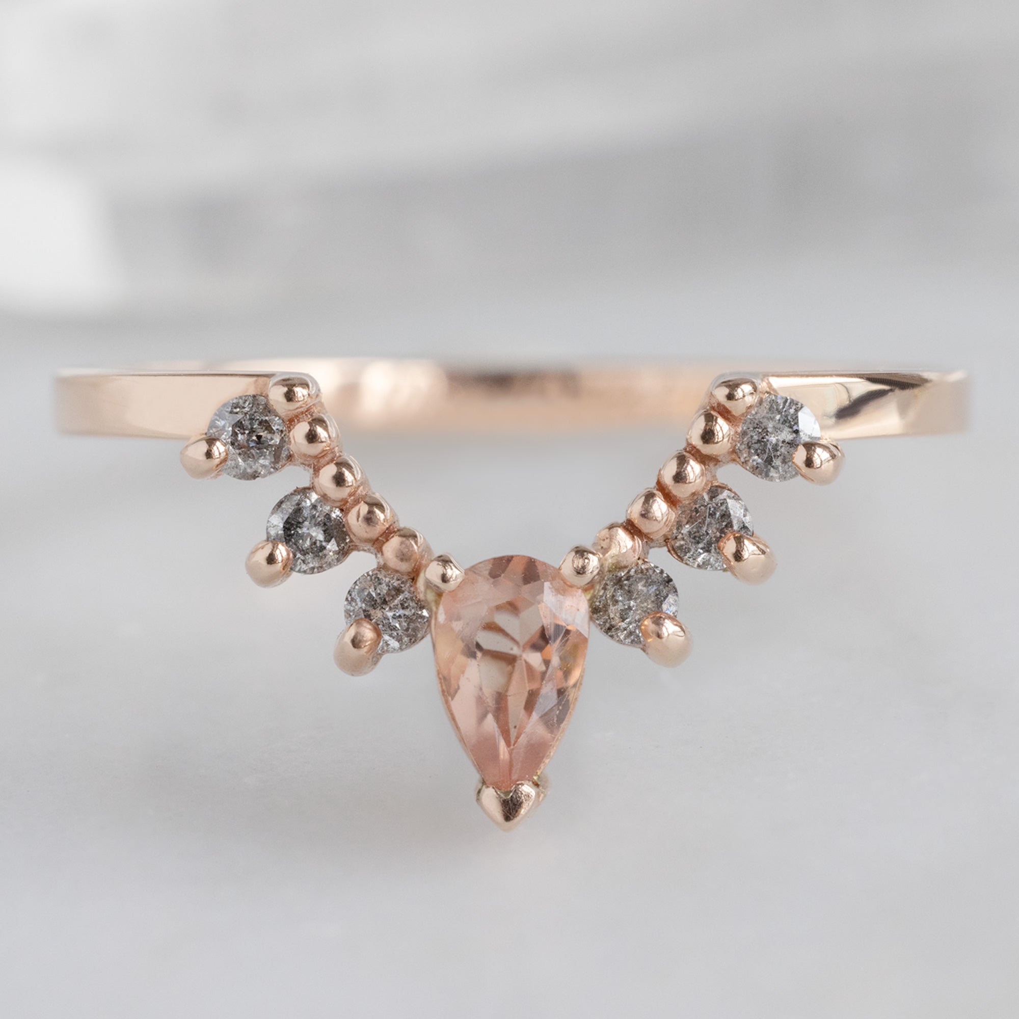 One of a Kind Sunstone and Salt and Pepper Diamond Sunburst Stacking Band in 14K Rose Gold on White Marble