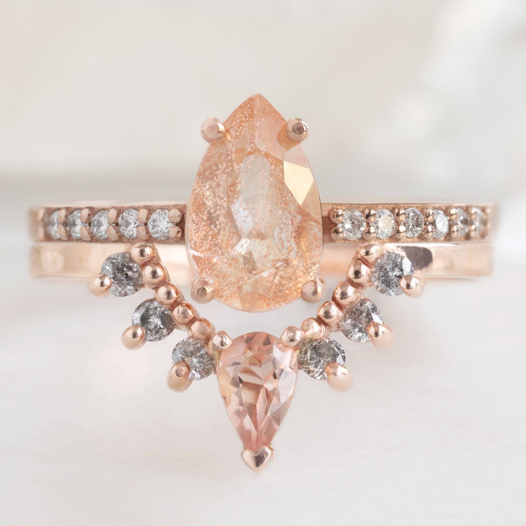 One of a Kind Sunstone and Salt and Pepper Diamond Sunburst Stacking Band in 14K Rose Gold Stacked with Sunstone Pear Gemstone Engagement Ring