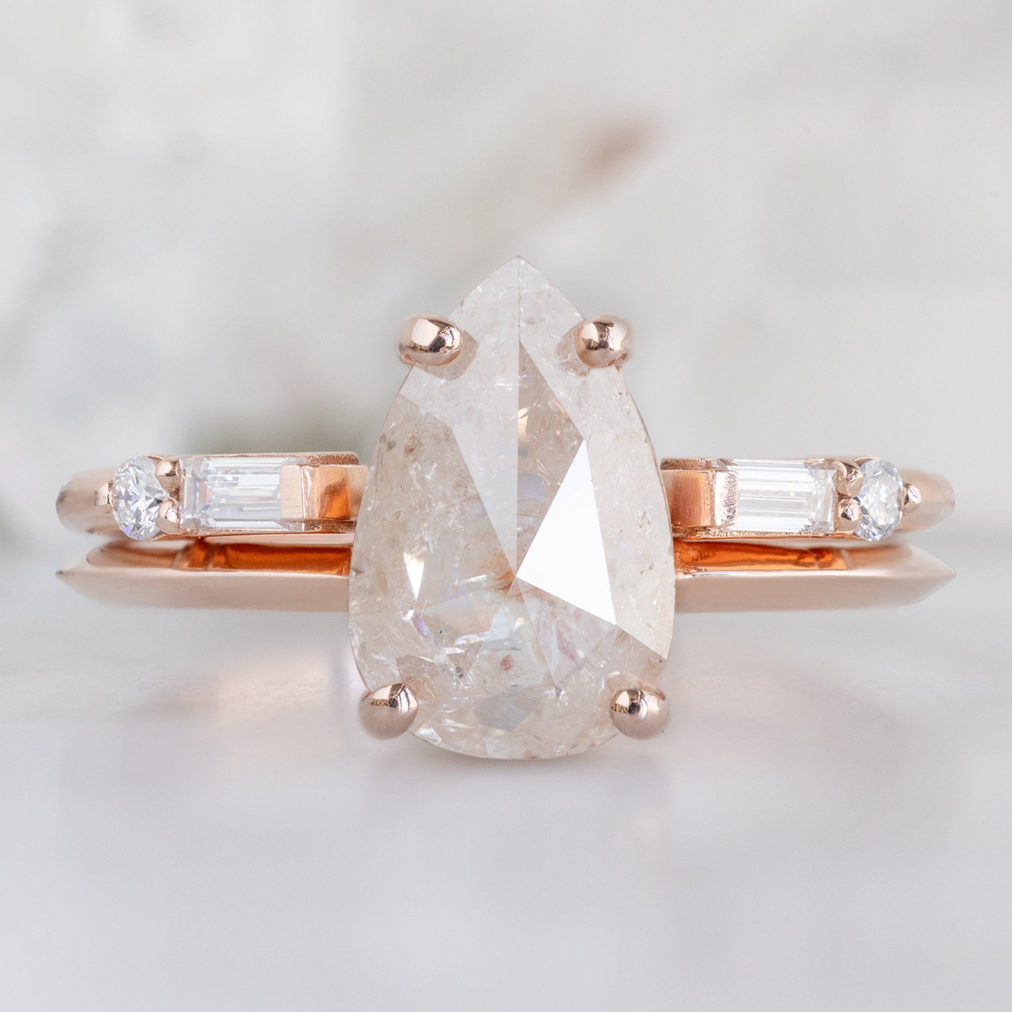 The Luxe Open Cuff White Baguette Diamond Stacking Band in 14K Rose Gold stacked with white diamond engagement ring