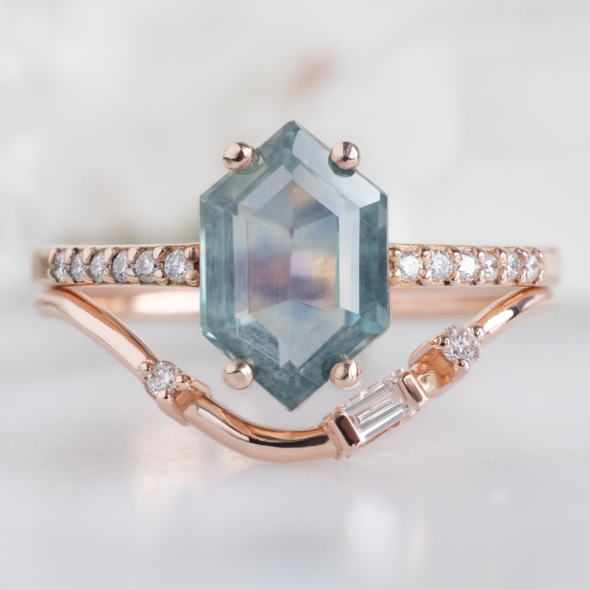 Asymmetrical Baguette Diamond Arc Stacking Band in 14K Rose Gold Stacked with a Blue Sapphire Gemstone Engagement Ring