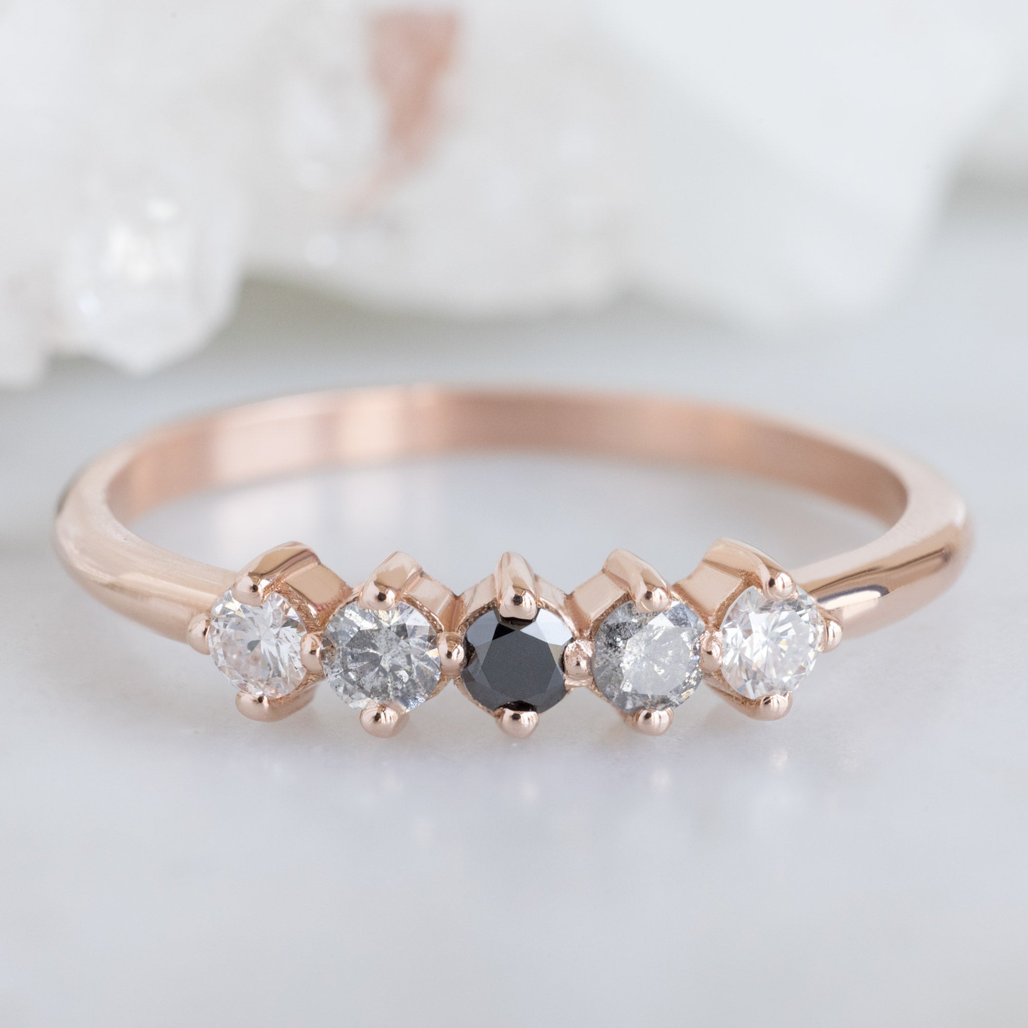 The Sequent Ombré Diamond Wedding Band in 14K Rose Gold on White Marble