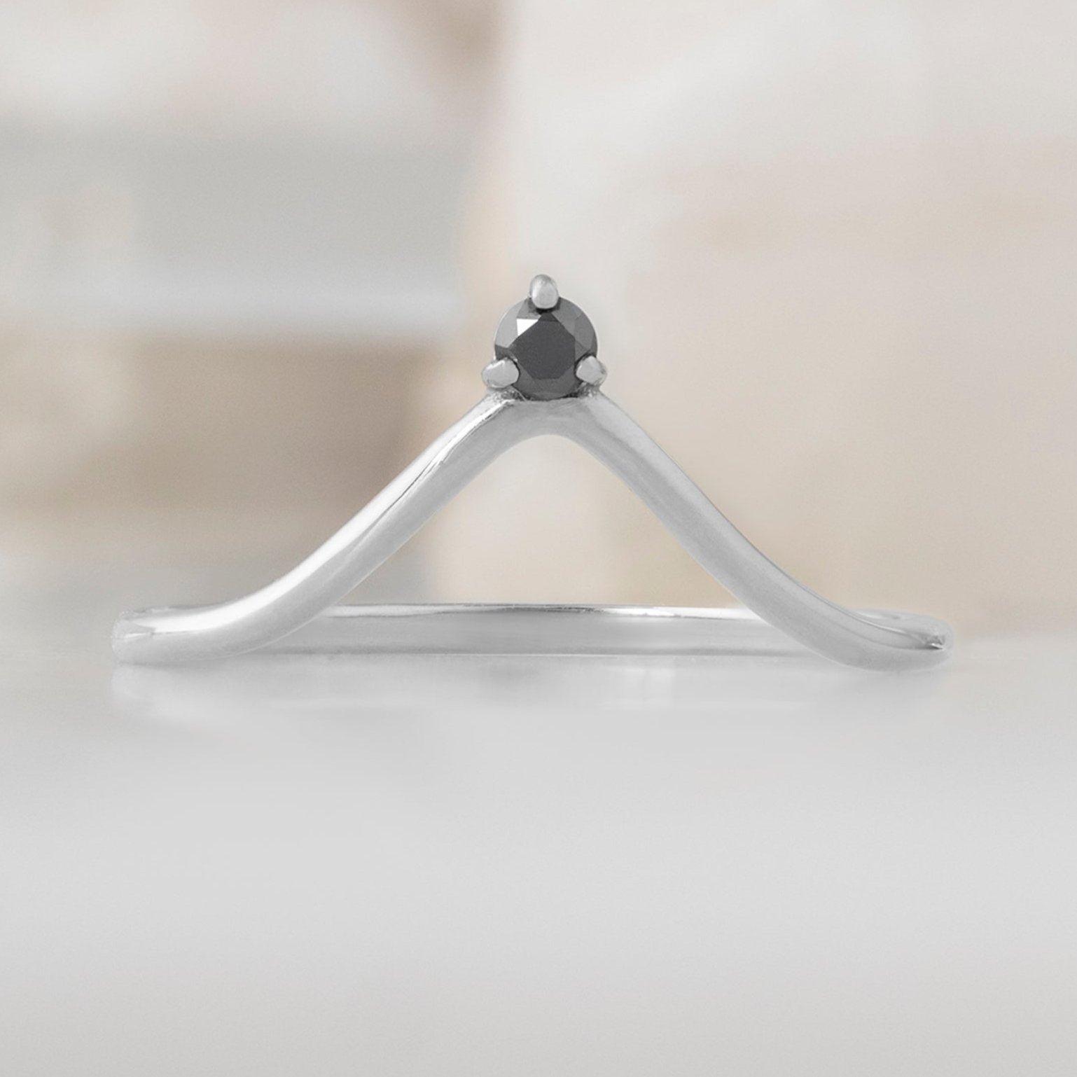 Black Diamond Crown Stacking Band in 14K White Gold on White Marble
