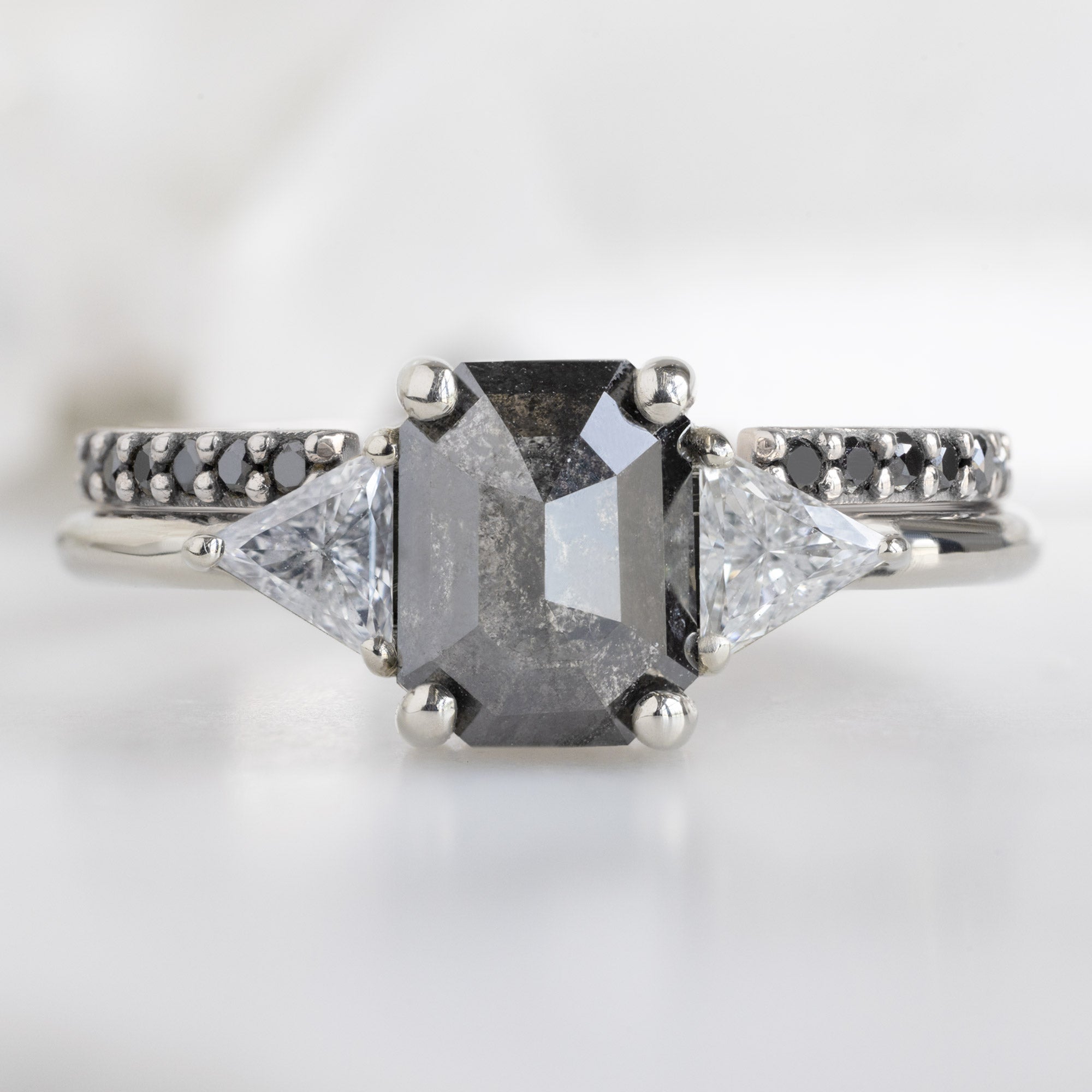 Open Cuff Black Diamond Pavé Stacking Band in 14K Yellow Gold Stacked with a Three Stone Diamond Engagement Ring