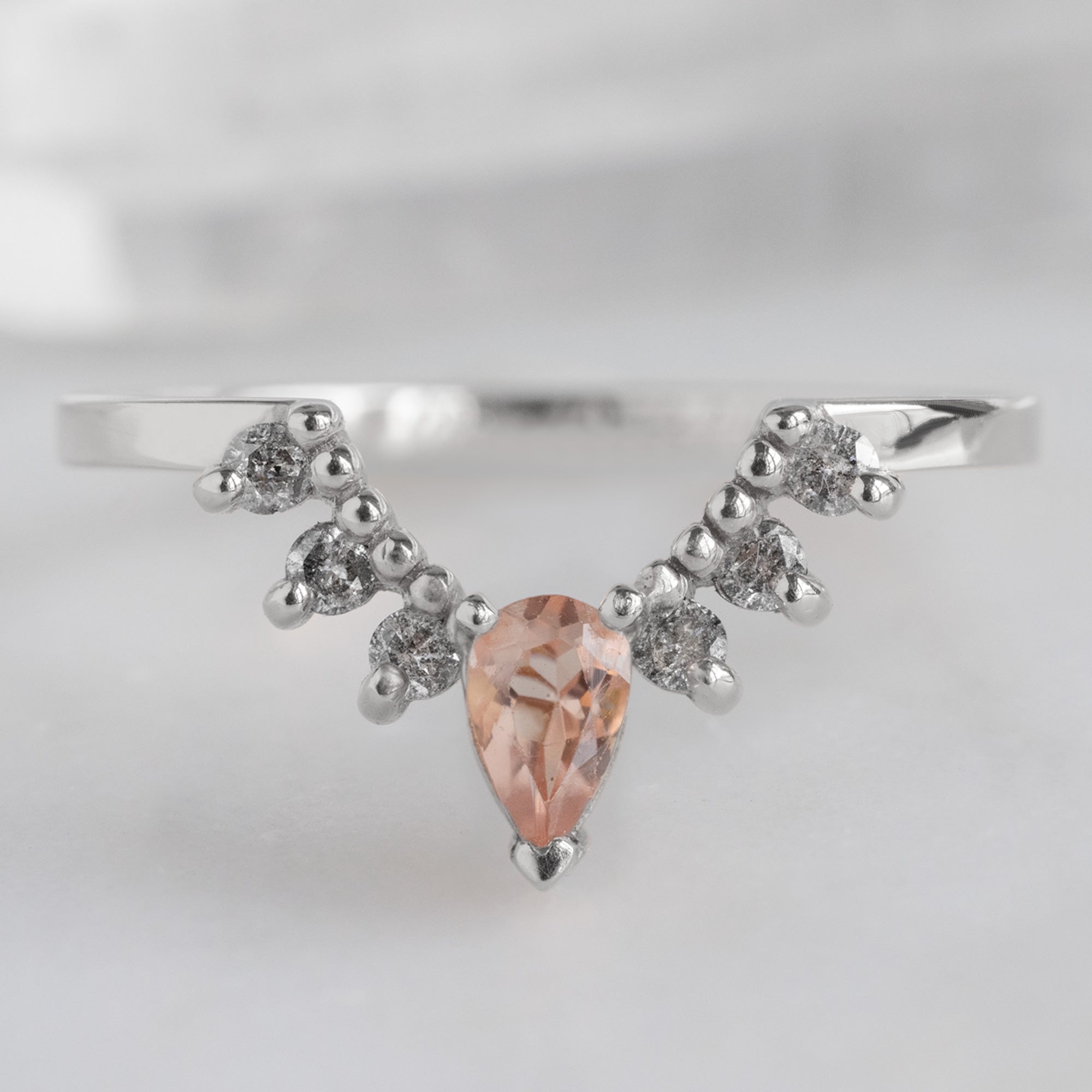 One of a Kind Sunstone and Salt and Pepper Diamond Sunburst Stacking Band in 14K White Gold on White Marble Tile