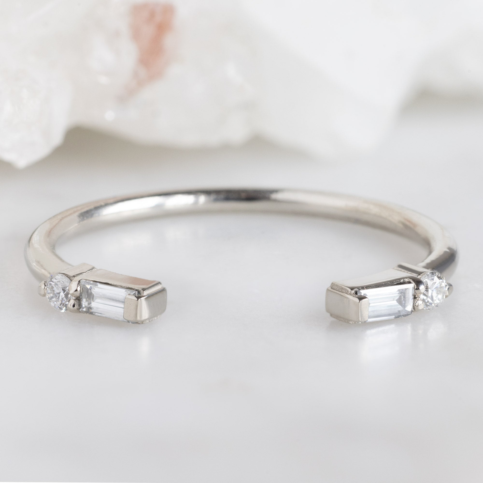 The Luxe Open Cuff White Baguette Diamond Stacking Band in 14K White Gold on White Marble