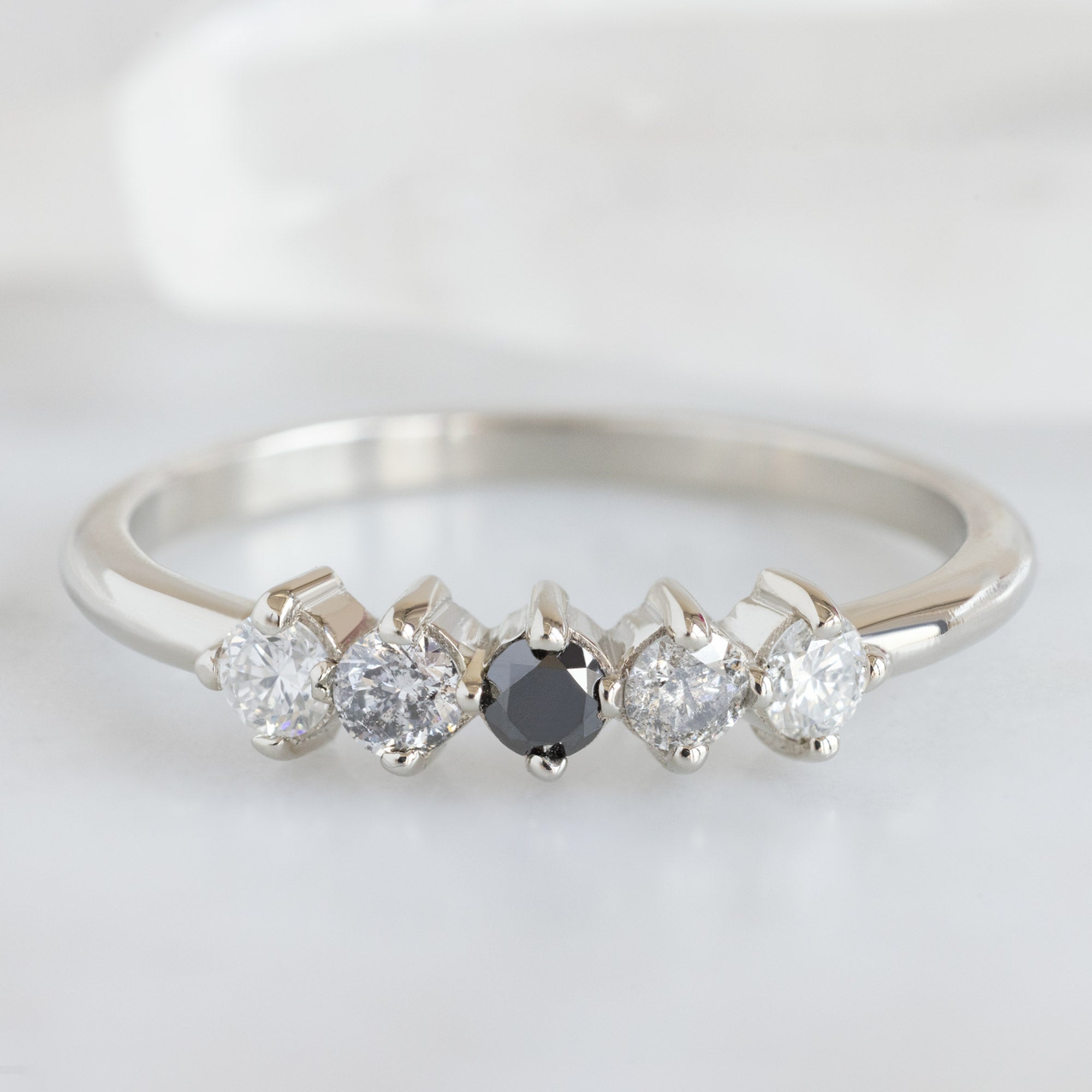 The Sequent Ombré Diamond Wedding Band in 14K White Gold on White Marble