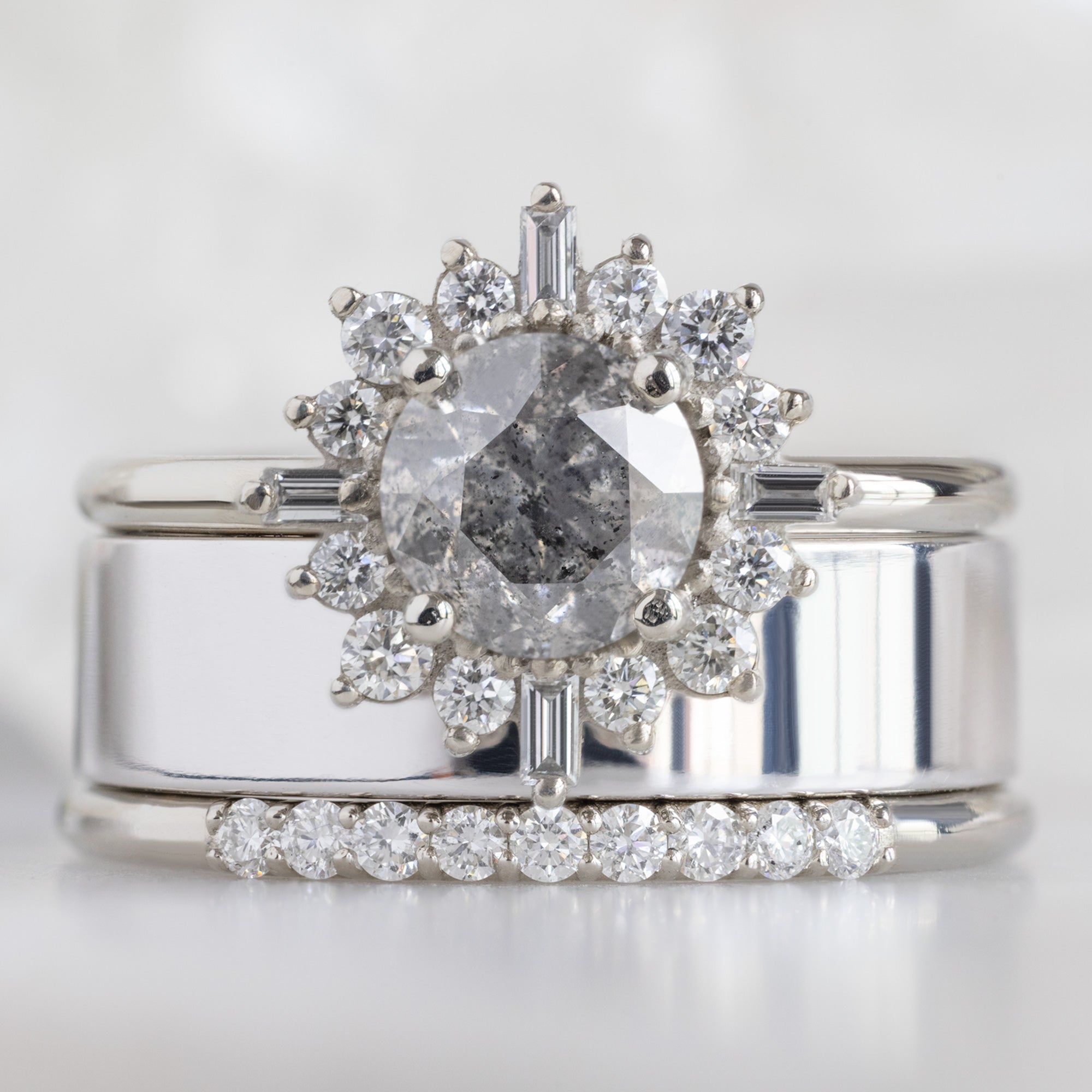 The Luxe White Diamond Pavé Wedding Band in 14K White Gold Stacked with Salt and Pepper Diamond Engagement Ring on Model