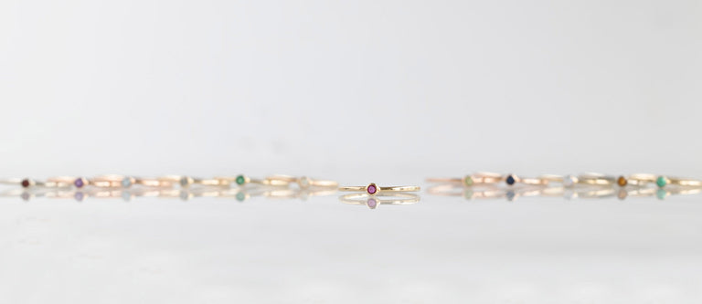 Alexis Russell Birthstone Stackers in a line