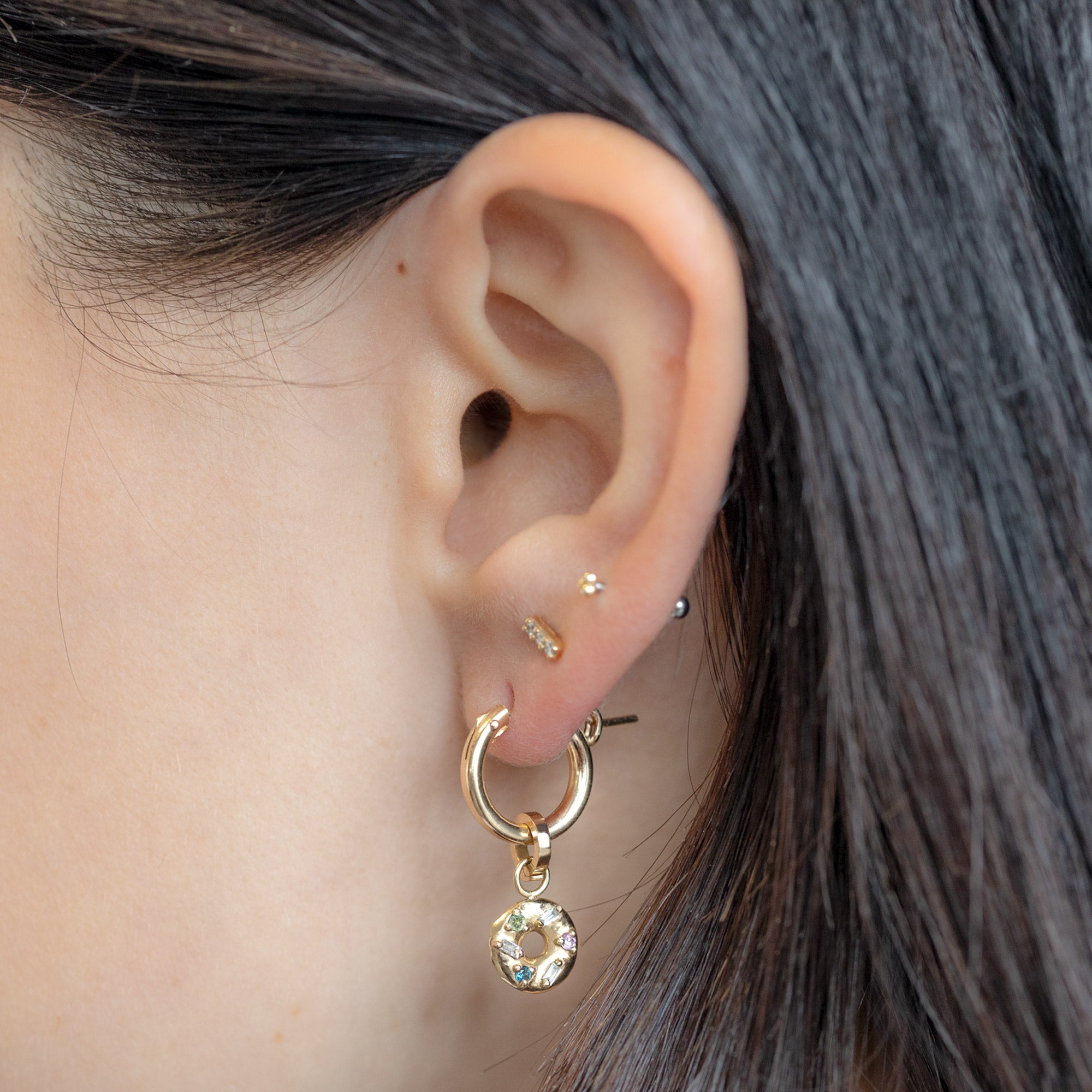 The Donut Charm in 10K Yellow Gold on Charm Hoop on Model