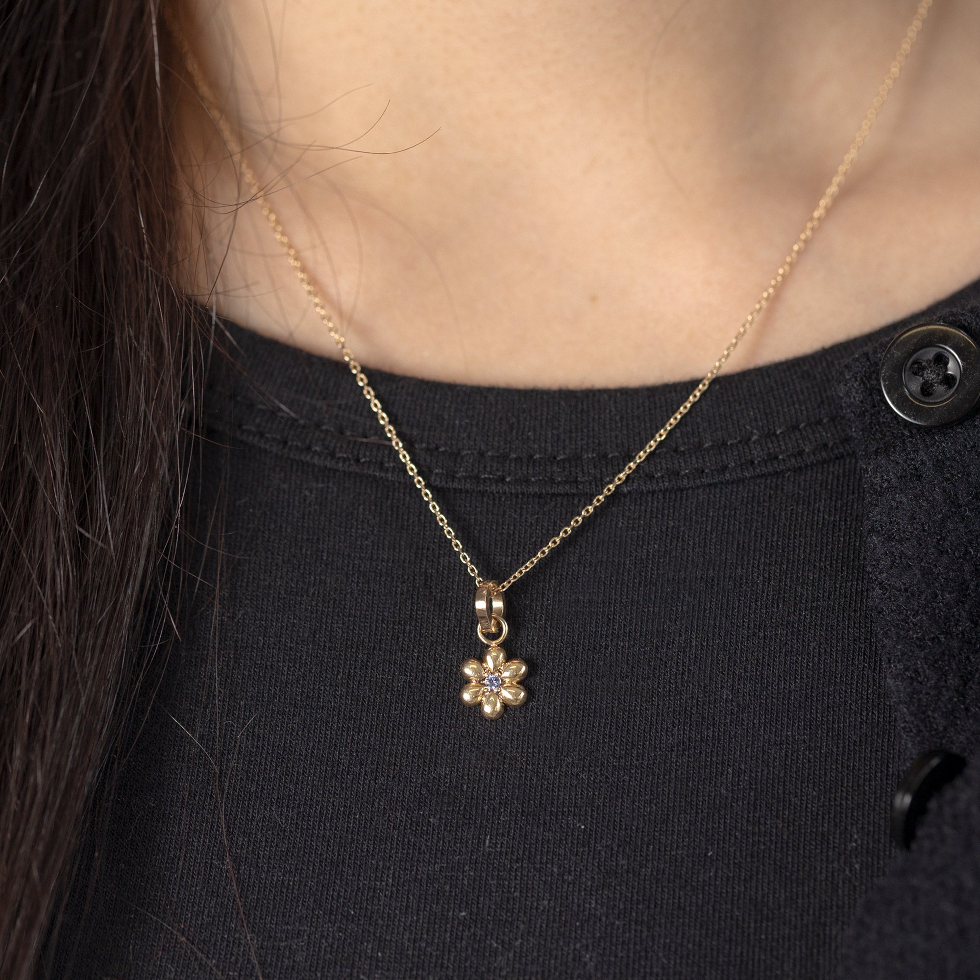 The Flower Power Charm in 10K Yellow Gold on Diamond-Cut Cable Chain on Model