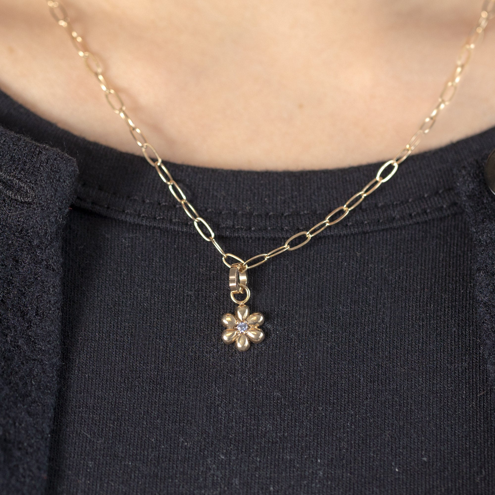 The Flower Power Charm in 10K Yellow Gold on Drawn Cable Chain Necklace on Model