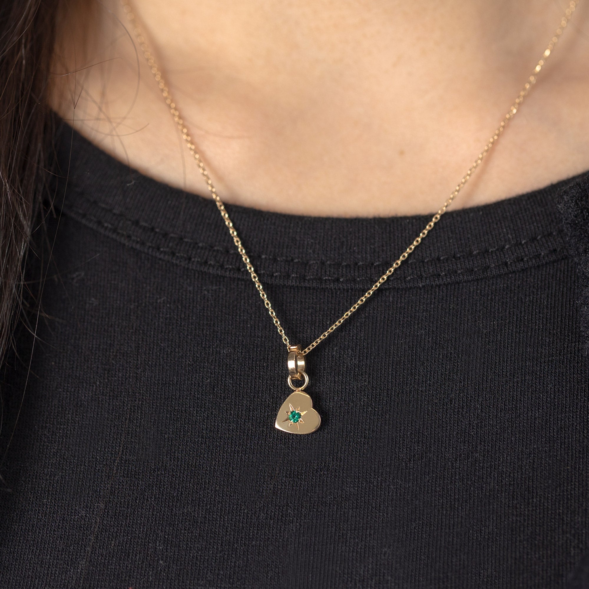 The Heart Charm in 10K Yellow Gold on Diamond Cut Cable Chain Necklace on Model
