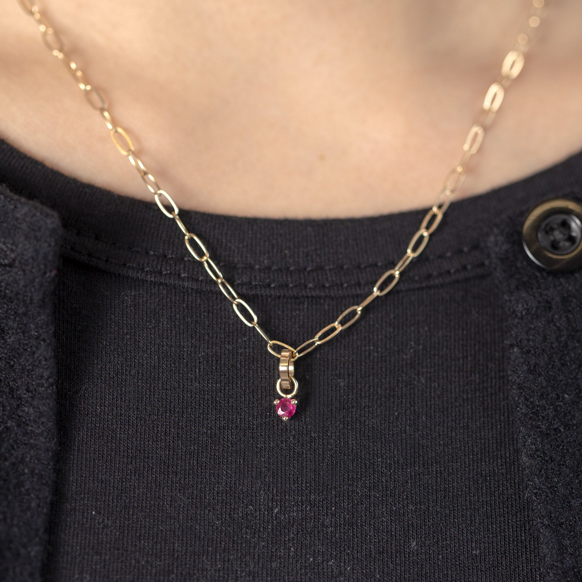The Ruby Birthstone Charm in 10K Yellow Gold on Drawn Cable Chain Necklace on Model