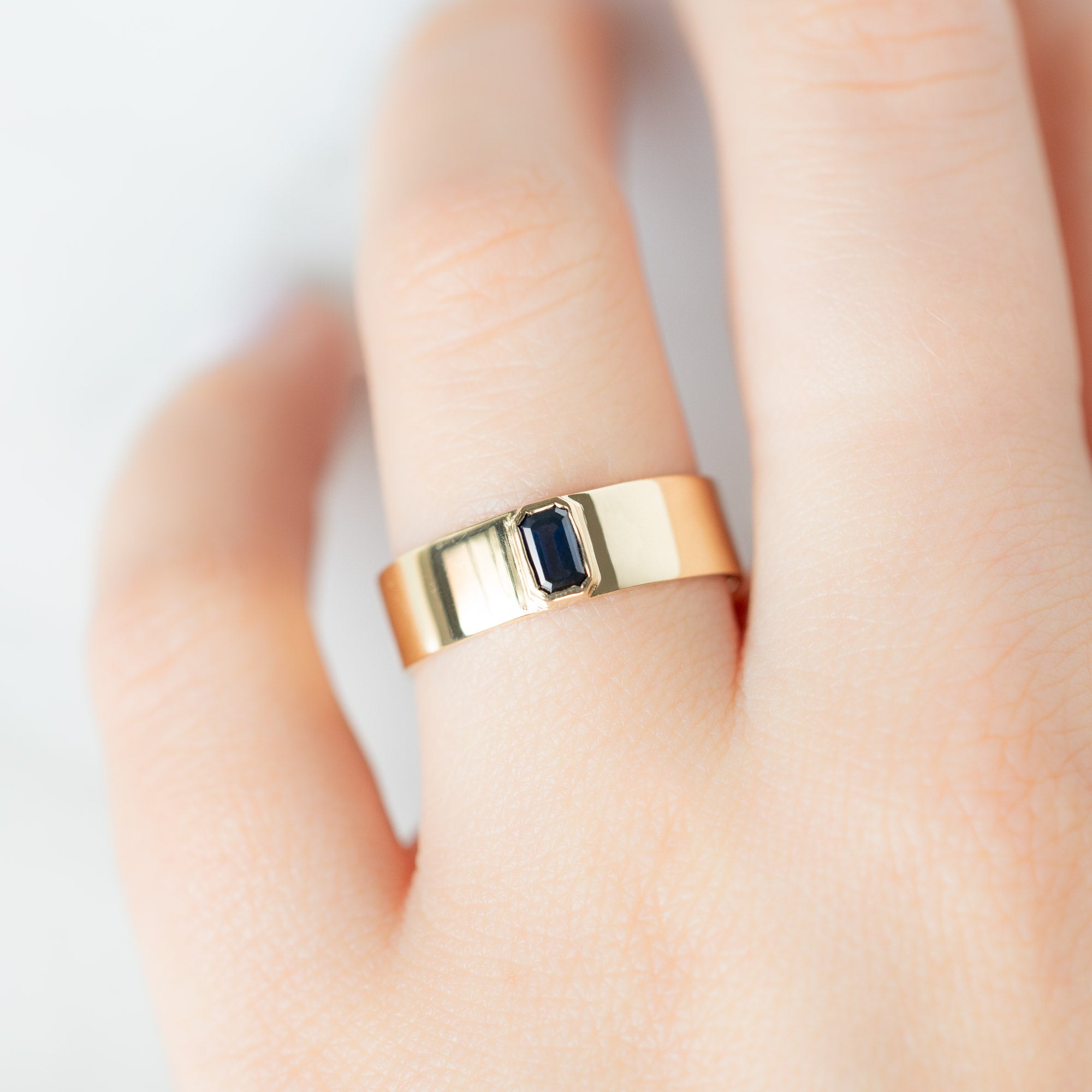 The Cigar Band with an Emerald-Cut Blue Sapphire | Yellow, Rose or White Gold