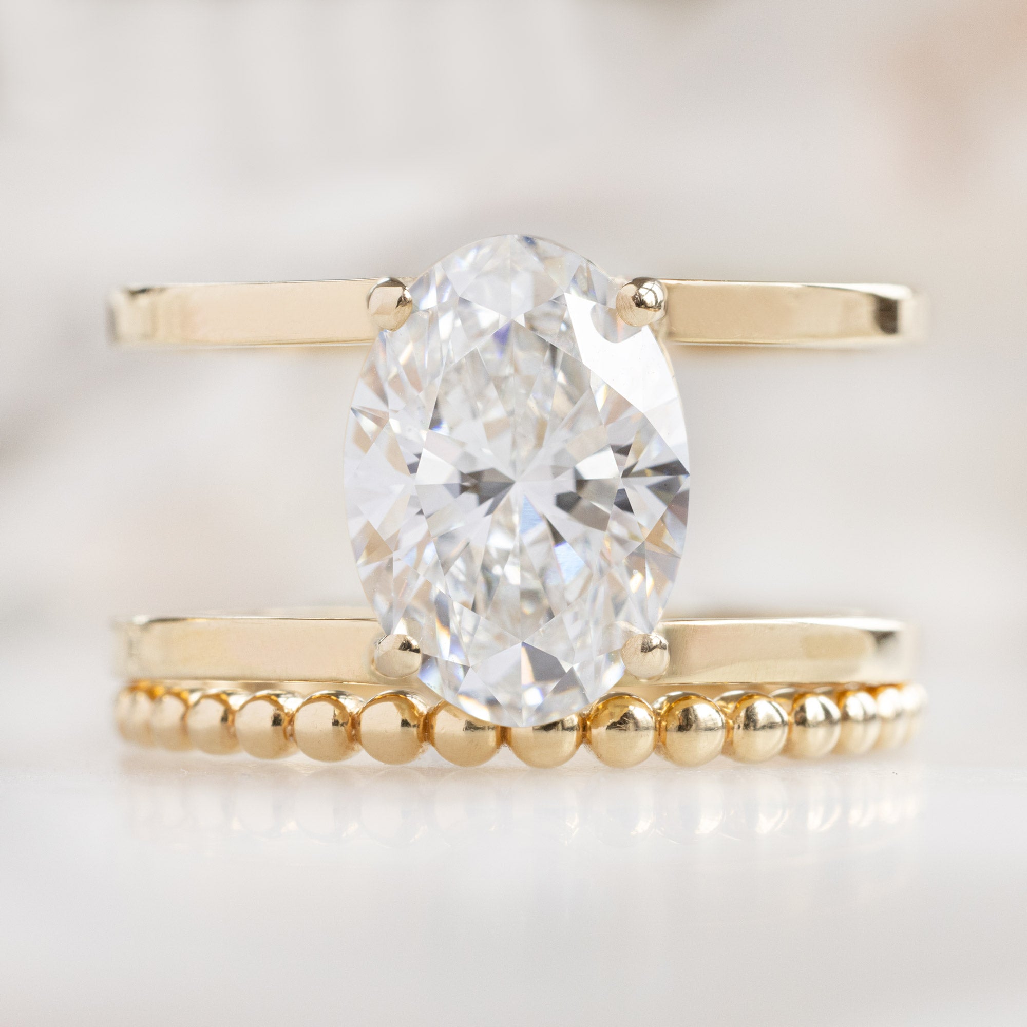 Alexis Russell Engagement Rings The Poppy Ring | 2.15ct Oval Cut Lab Grown Diamond in 14K Yellow Gold