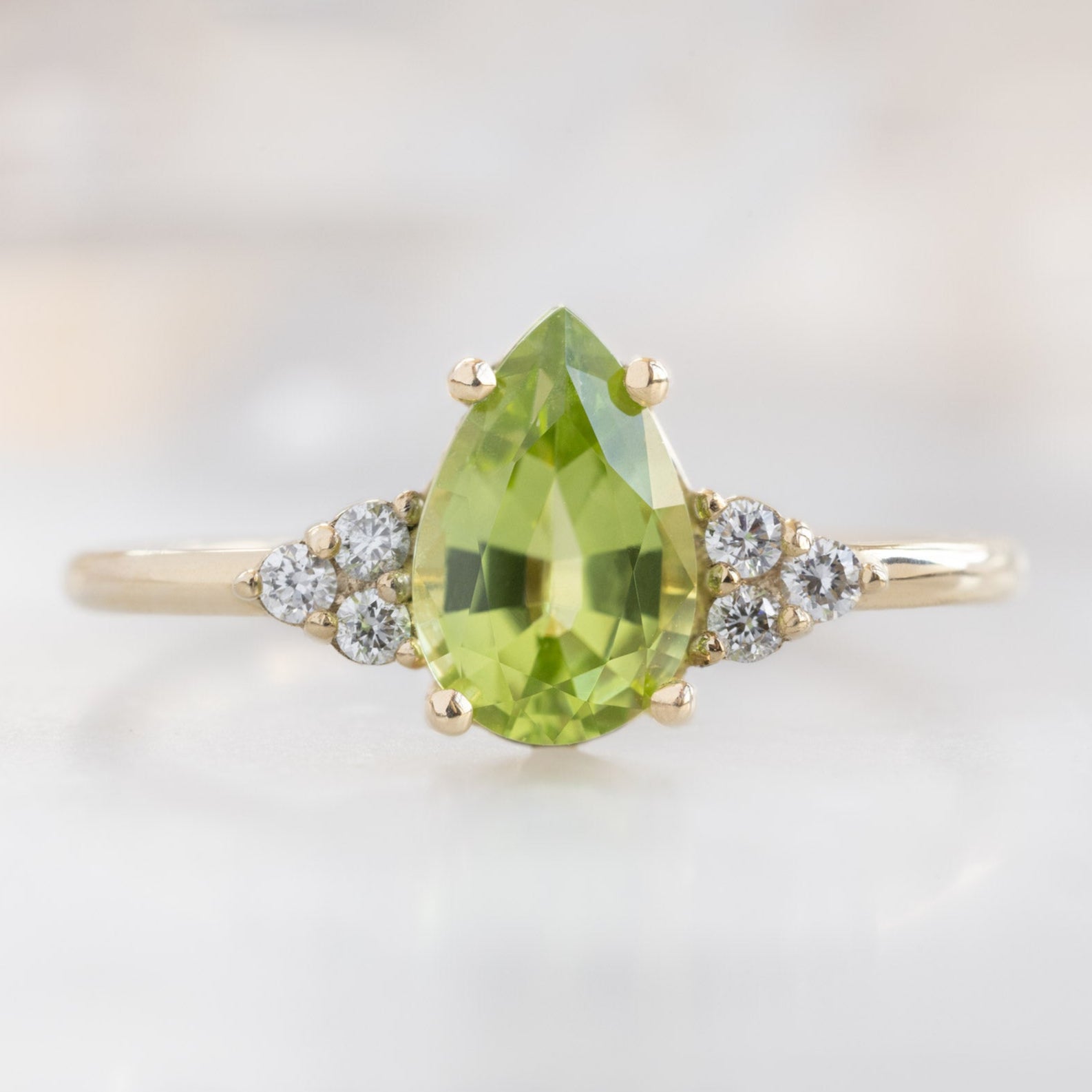 Alexis Russell  Engagement Rings The Ivy Ring | 0.83ct Pear Peridot in 14K Yellow Gold