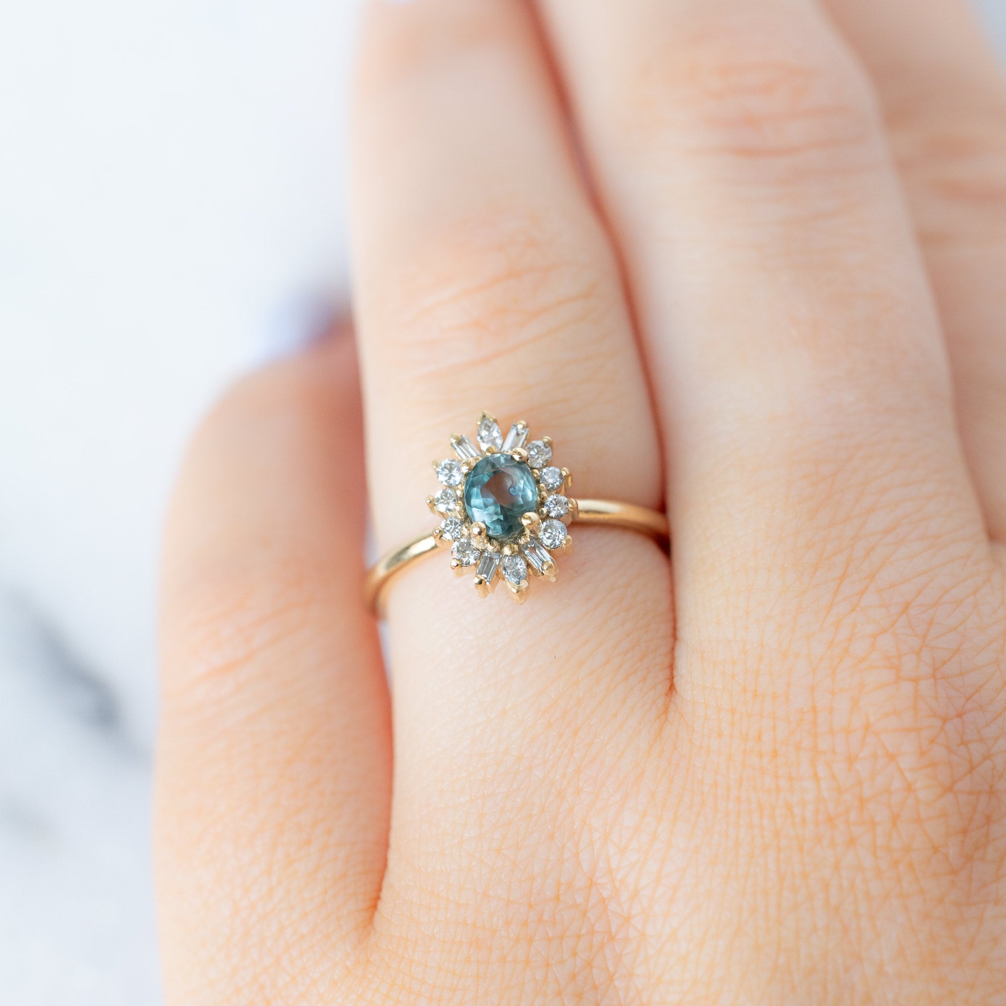 Alexis Russell  Engagement Rings The Camellia Ring | 0.81ct Oval Blue Montana Sapphire in 14K Yellow Gold