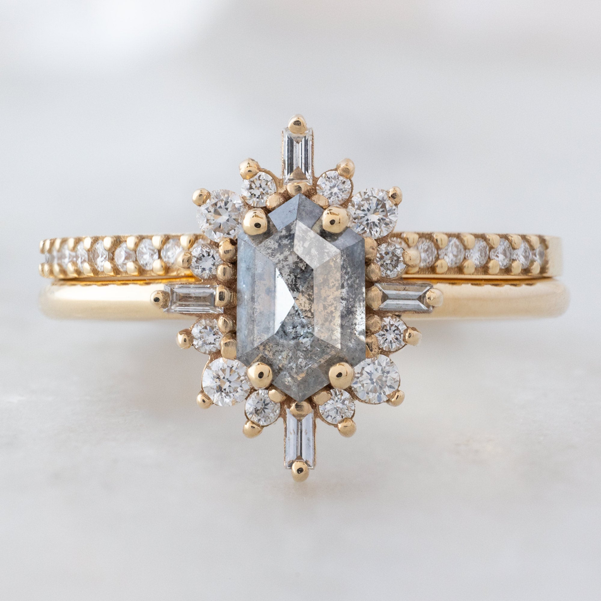 The Compass Ring with a Hexagon Salt and Pepper Diamond in 14K Yellow Gold Stacked with the White Diamond Pavé Stacking Band