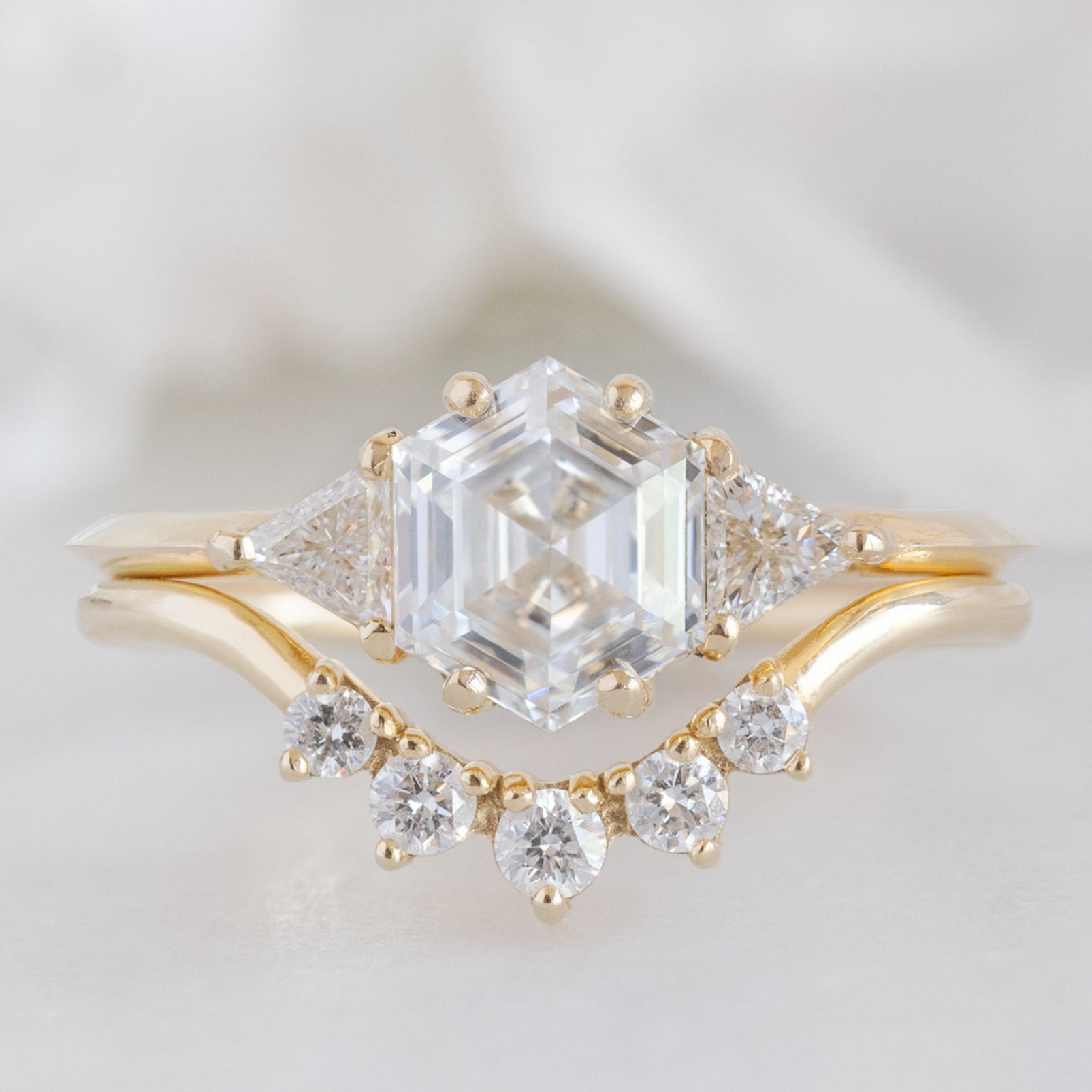 The Jade Ring with a Lab Grown White Hexagon Diamond in 14K Yellow Gold Stacked with the Round White Diamond Sunburst Stacking Band