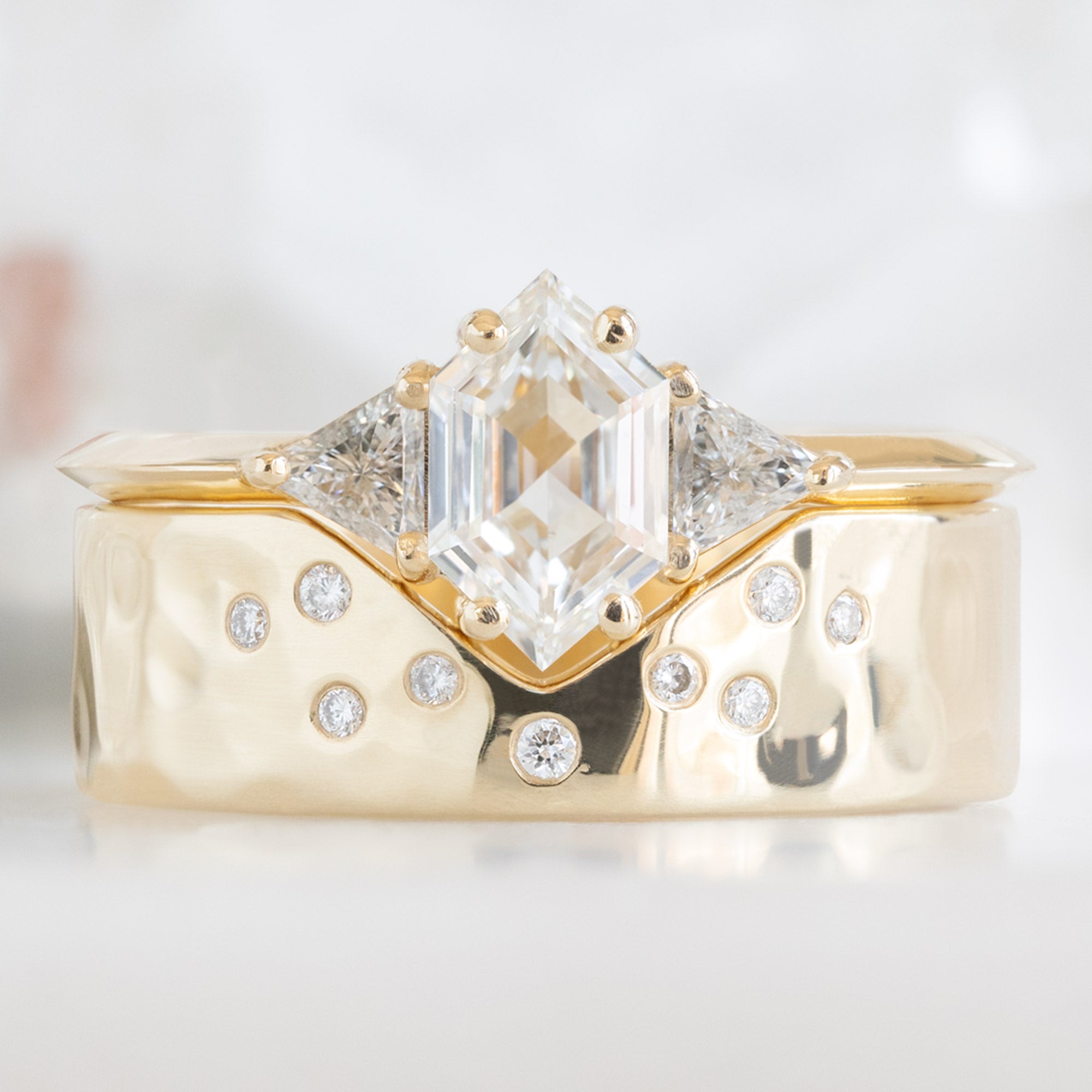 The Jade Ring with a Lab Grown White Hexagon Diamond in 14K Yellow Gold Stacked with the Constellation Peak Stacking Band