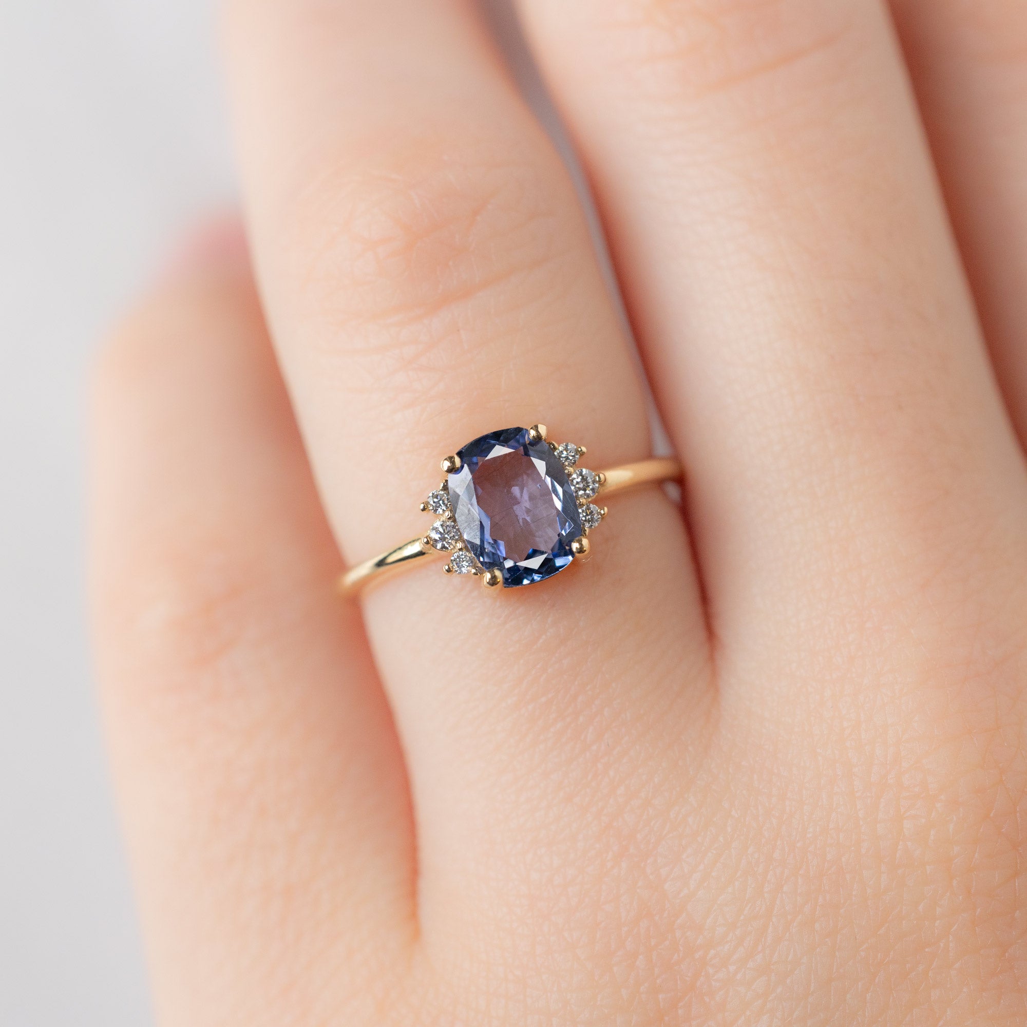 The Sunflower Ring with a 1.02ct Cushion Cut Tanzanite in 14K Yellow Gold on Model