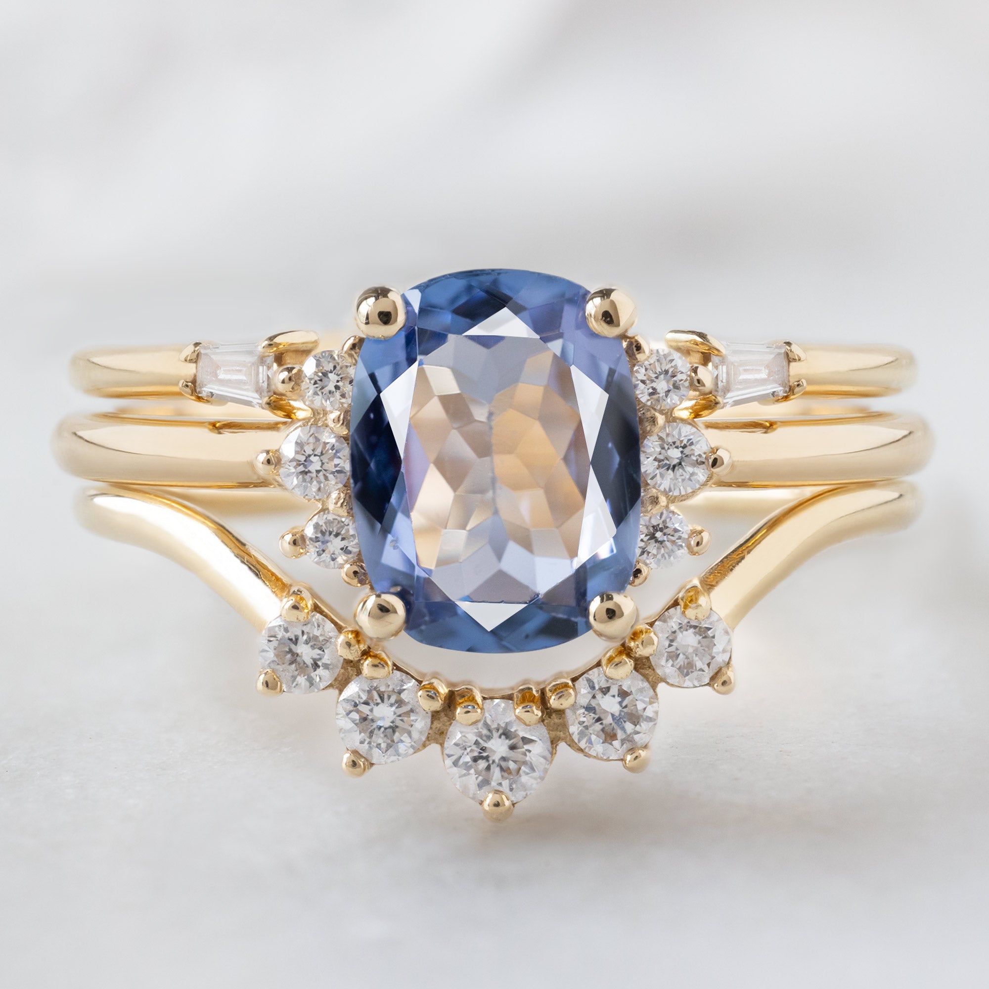 buy:open-cuff-baguette-white-diamond-stacking-band-14k-or-18k-yellow-gold,the-sunflower-ring-1-02ct-cushion-cut-tanzanite-in-14k-yellow-gold,round-white-diamond-sunburst-stacking-band-14k-or-18k-yellow-gold