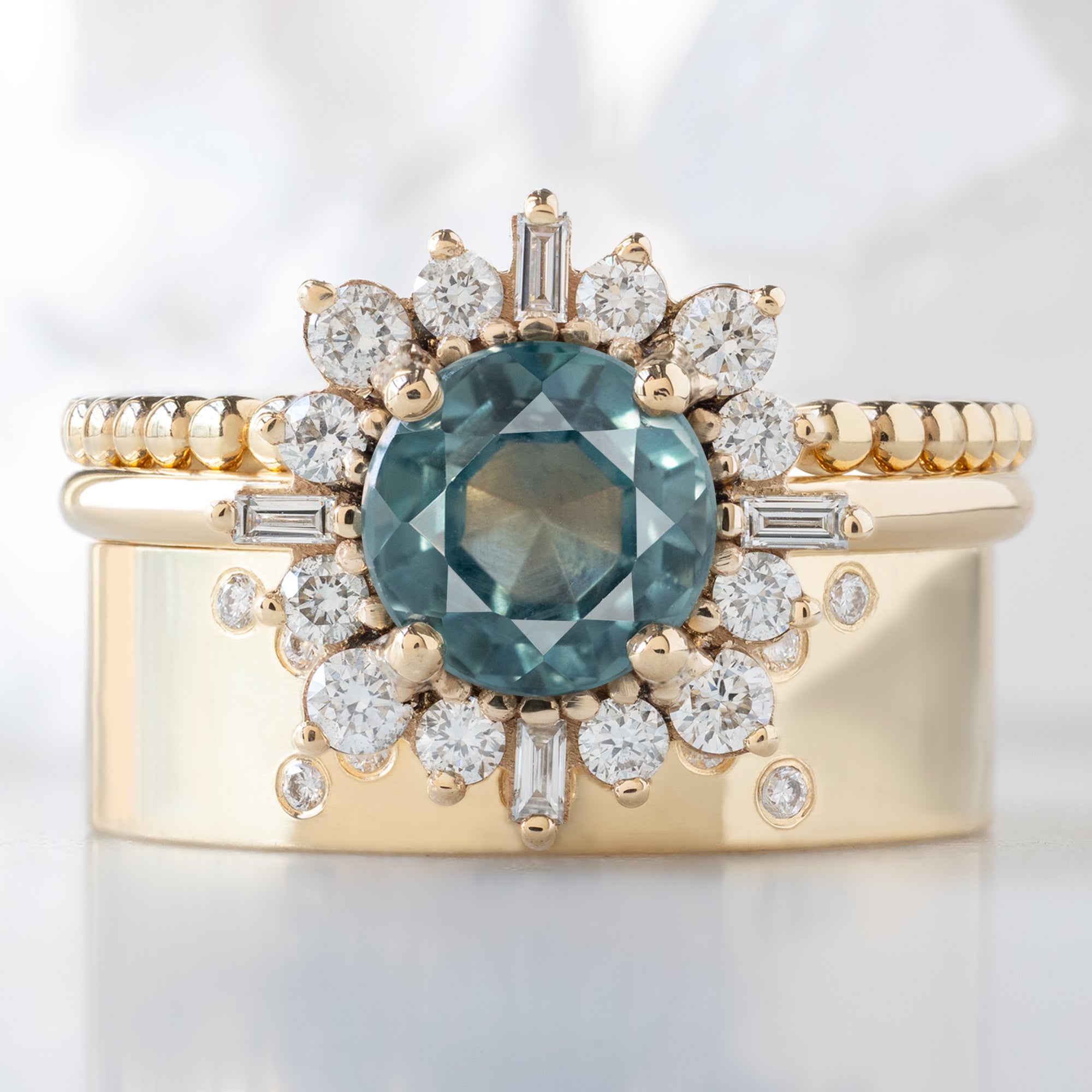 buy:the-gold-beaded-stacking-ring-14k-yellow-gold,the-compass-ring-1-66ct-round-blue-sapphire-in-14k-yellow-gold,constellation-cut-out-stacking-band-arc-cut-out-in-14k-yellow-gold