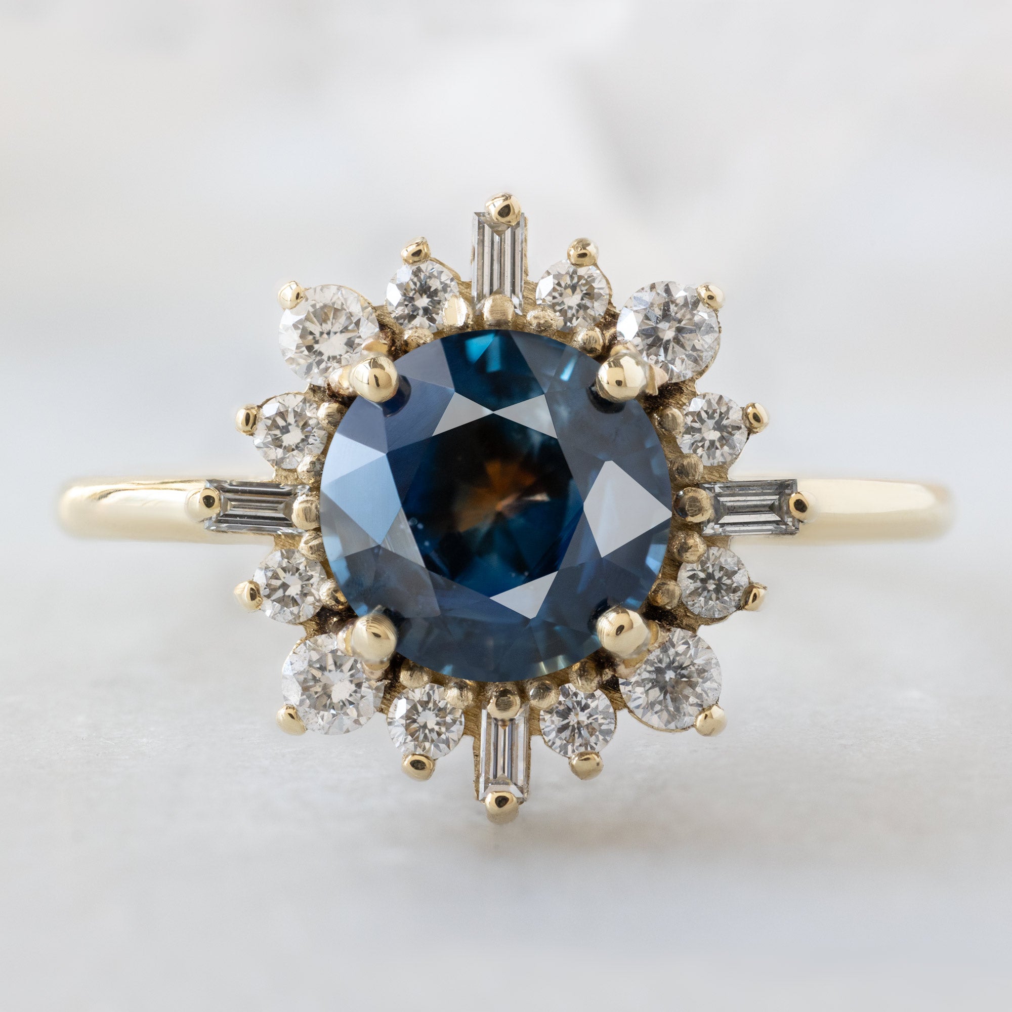 Alexis Russell  Engagement Rings The Compass Ring | 1.61ct Round Montana Sapphire in 14K Yellow Gold