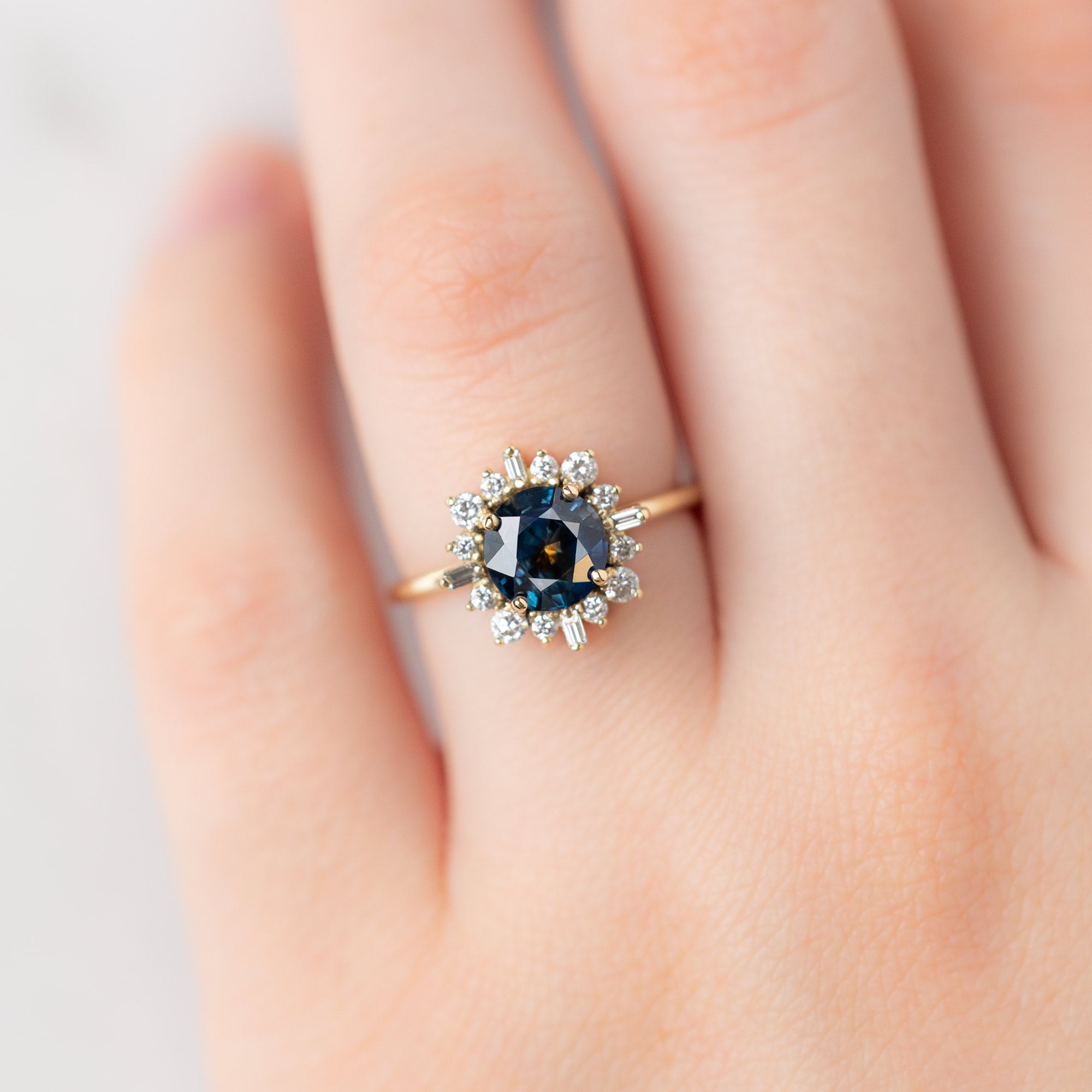 Alexis Russell  Engagement Rings The Compass Ring | 1.61ct Round Montana Sapphire in 14K Yellow Gold