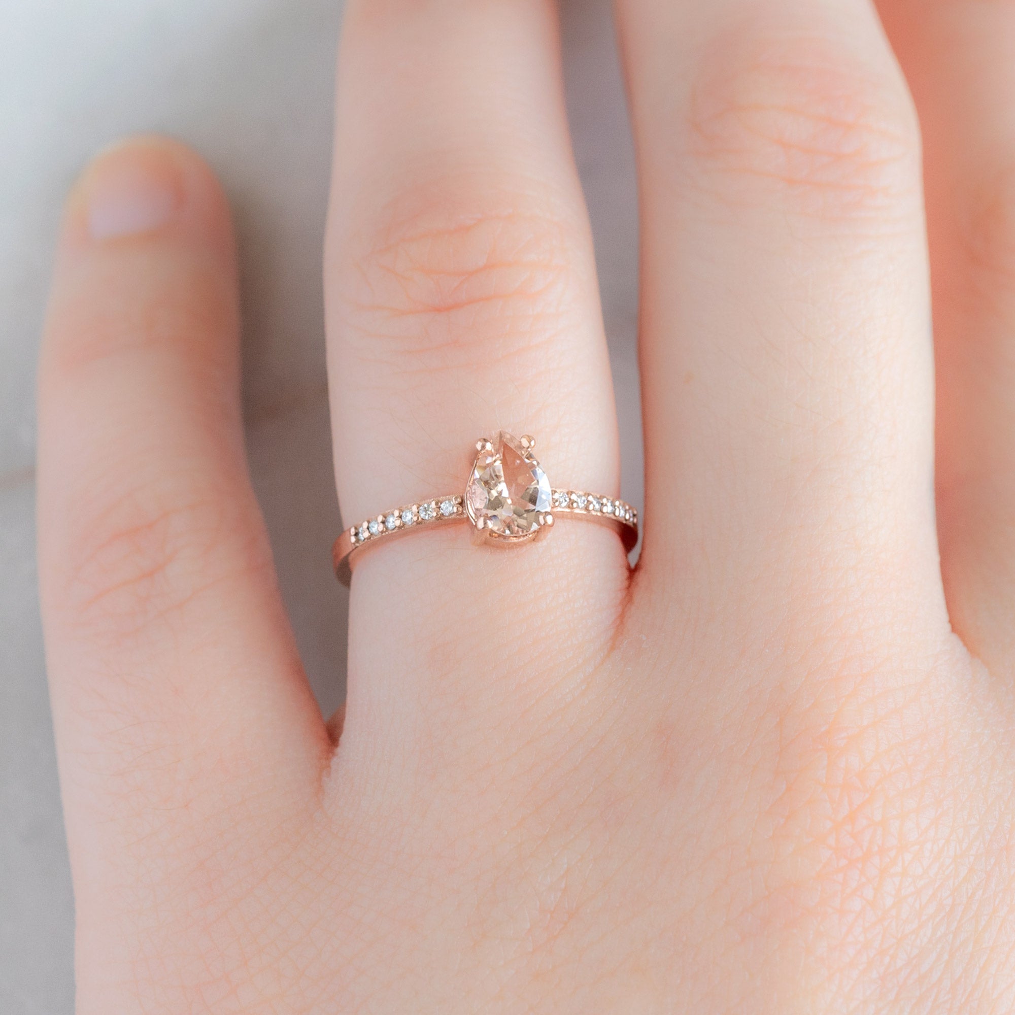 The Willow Ring with a 0.58ct Pear Morganite in 14K Rose Gold on Model
