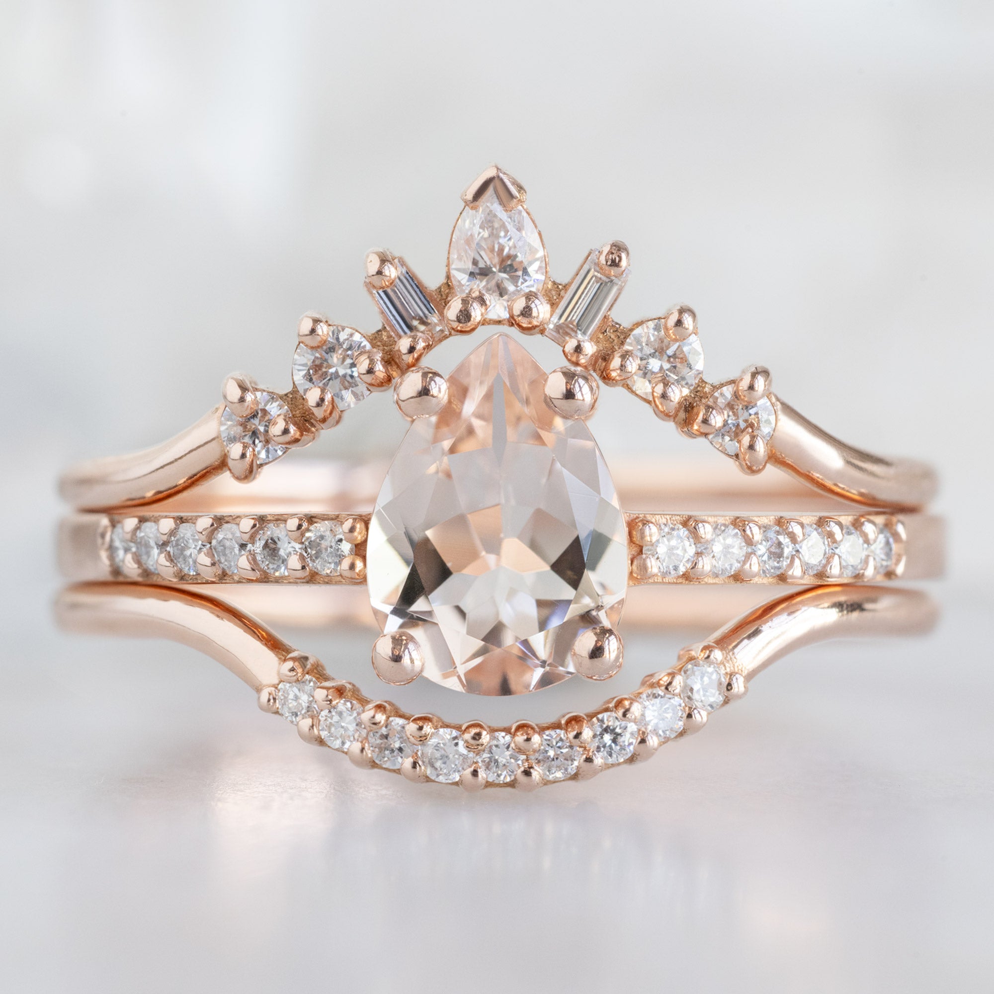 buy:geometric-white-diamond-sunburst-stacking-band-14k-or-18k-yellow-gold,the-willow-ring-0-58ct-pear-morganite-in-14k-rose-gold,white-diamond-pave-arc-stacking-band-14k-or-18k-yellow-gold