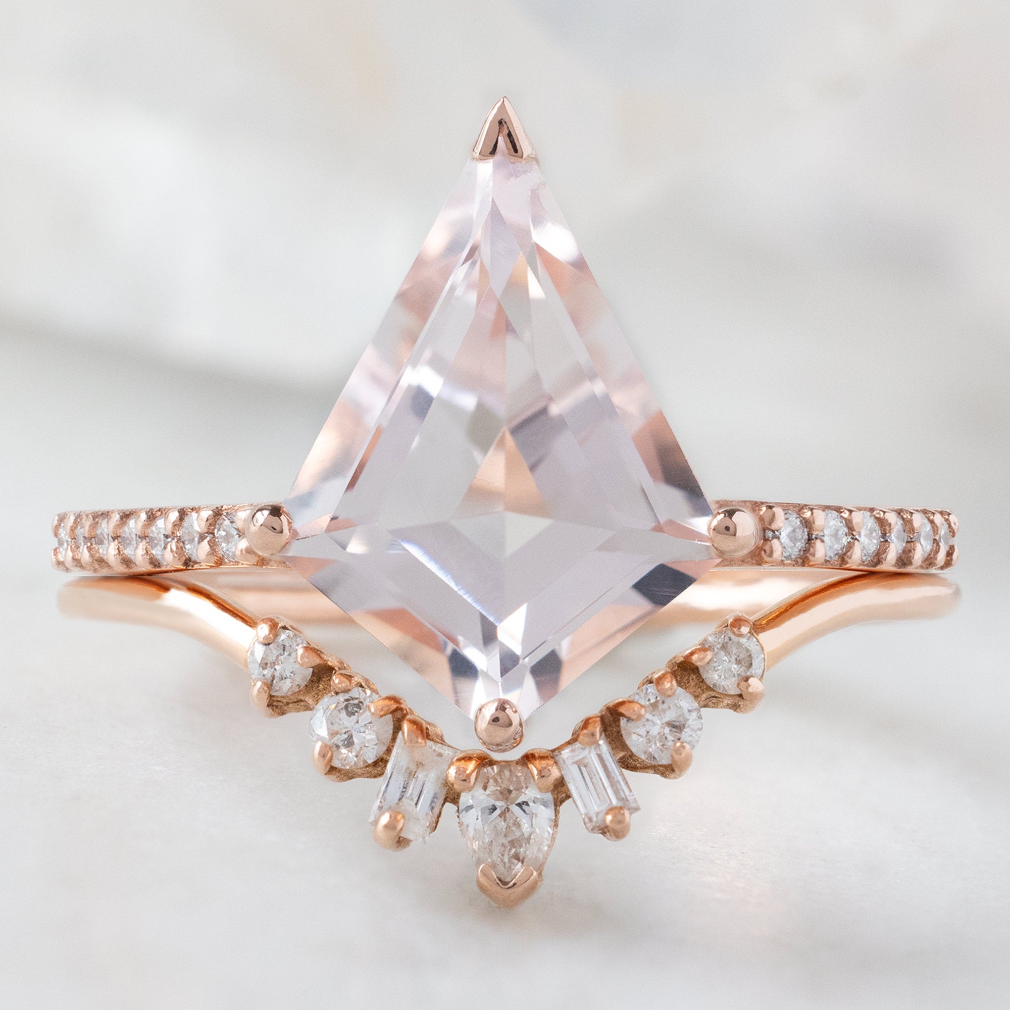 The Willow Ring with a 2.31ct Kite Morganite in 14K Rose Gold Stacked with the Geometric Diamond Sunburst Stacking Band