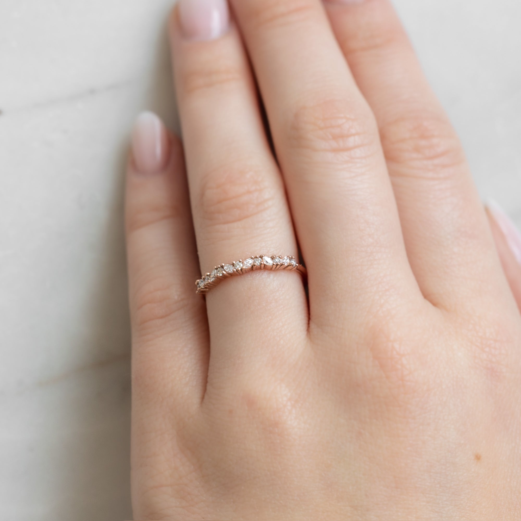 The Marquise Confetti Wedding Band in 14K Rose Gold on Model