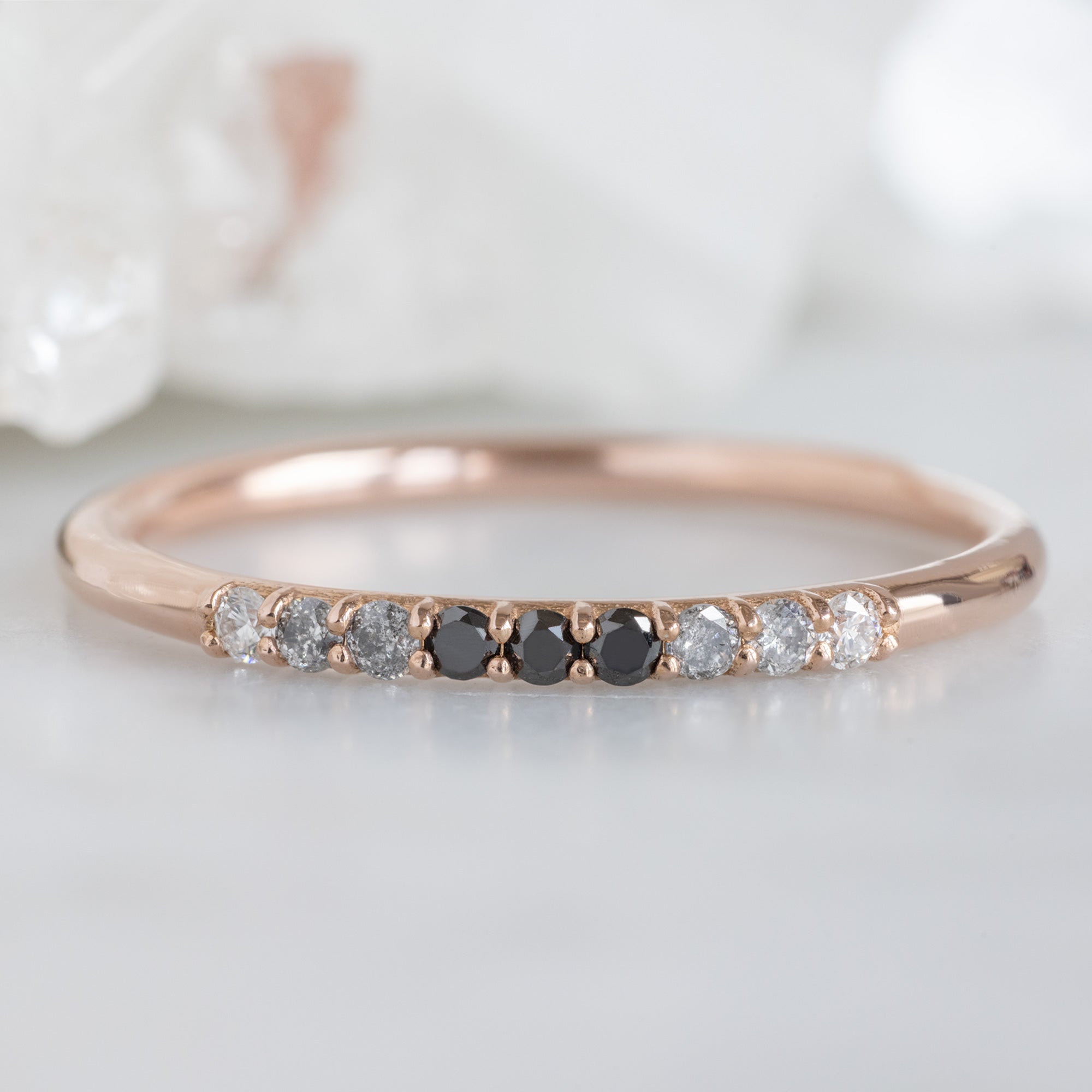 The Luxe Ombré Diamond Pavé Wedding Band in 14K Rose Gold on White Marble